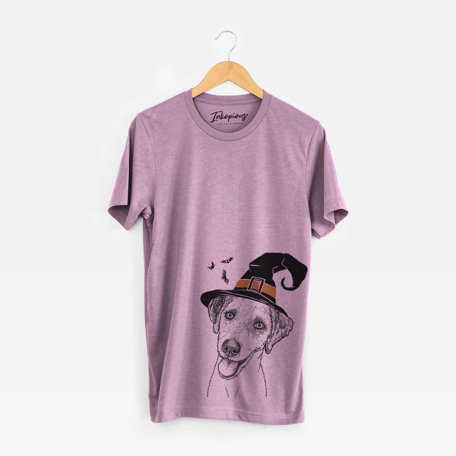Hand-drawn sketch of Palm Palm the Aussiedoodle wearing a witch hat on an Orchid Unisex crewneck