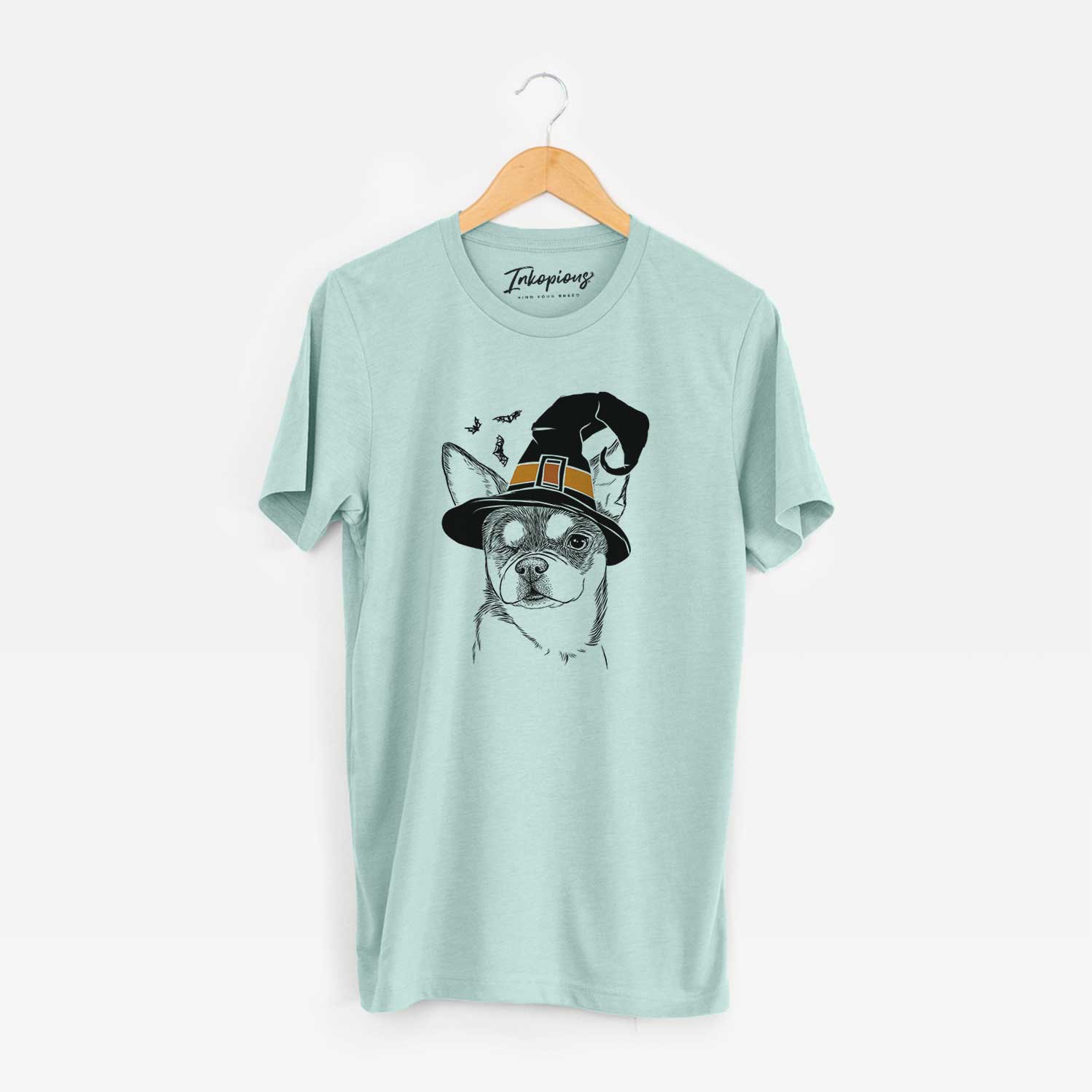 Hand-drawn sketch of Paris the Chihuahua wearing a witch hat on a Heather Sage Unisex crewneck