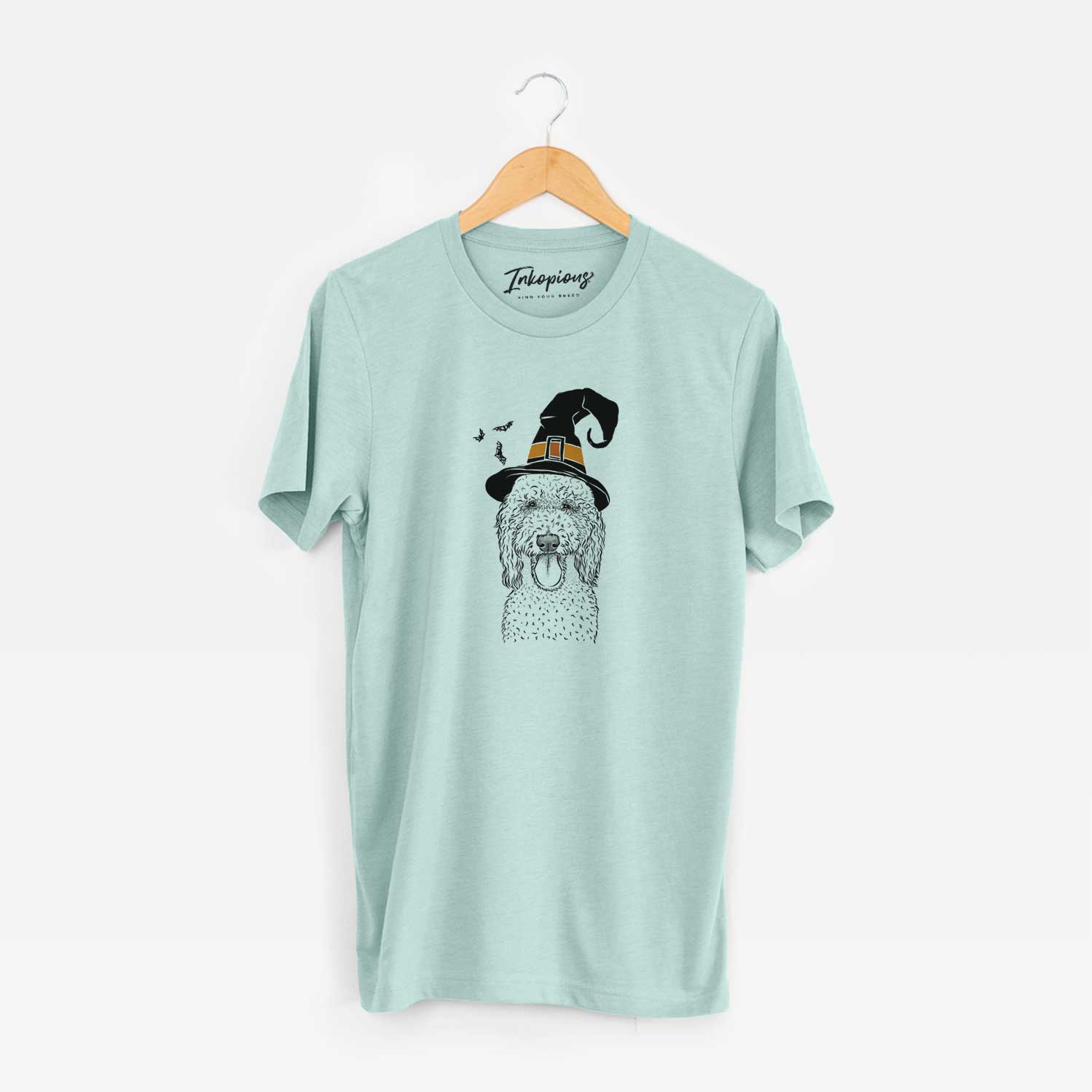 Hand-drawn sketch of Pavlov the Goldendoodle wearing a witch hat on a Heather Sage Unisex crewneck