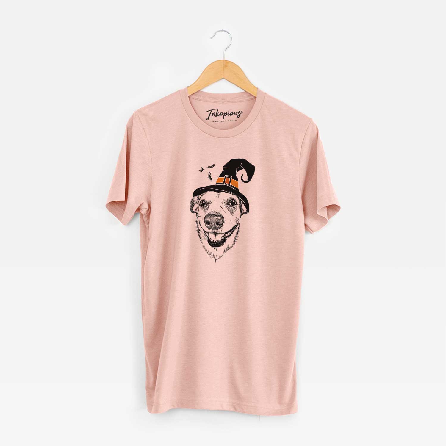 Hand-drawn sketch of Petrah the Staffy Mix wearing a witch hat on a Peach Unisex crewneck