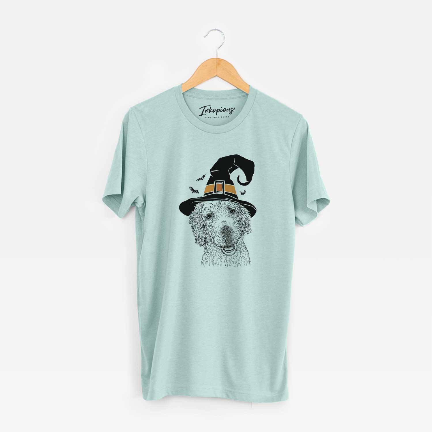 Hand-drawn sketch of Preston the Labradoodle wearing a witch hat on a Heather Sage Unisex crewneck