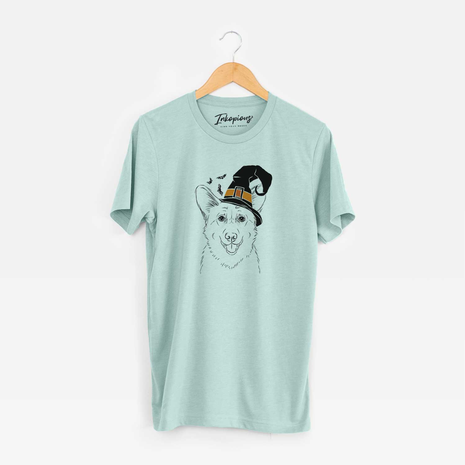 Hand-drawn sketch of Ricco the Corgi wearing a witch hat on a Heather Sage Unisex crewneck