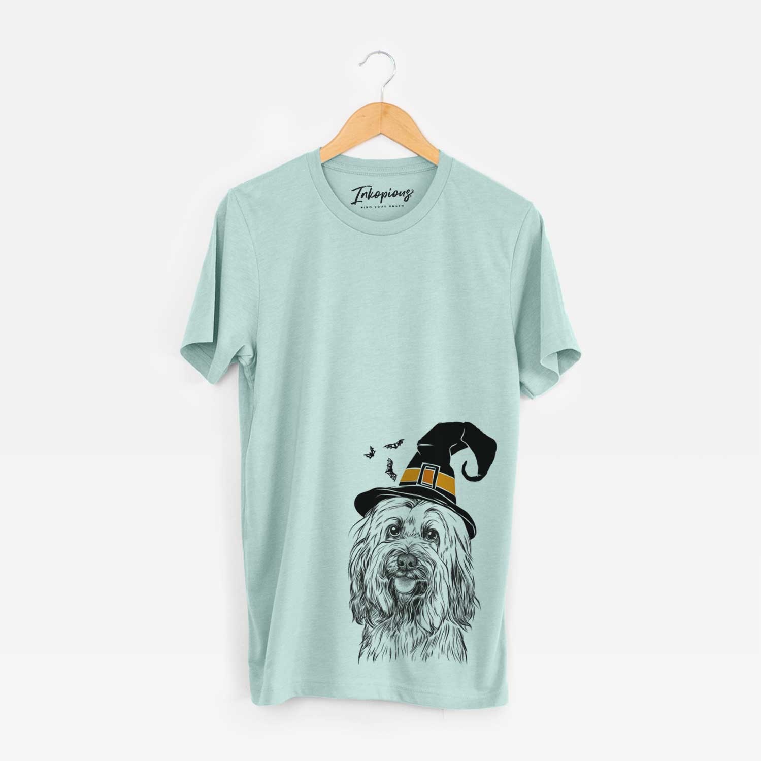 Hand-drawn sketch of Rime the Tibetan Terrier wearing a witch hat on a Heather Sage Unisex crewneck