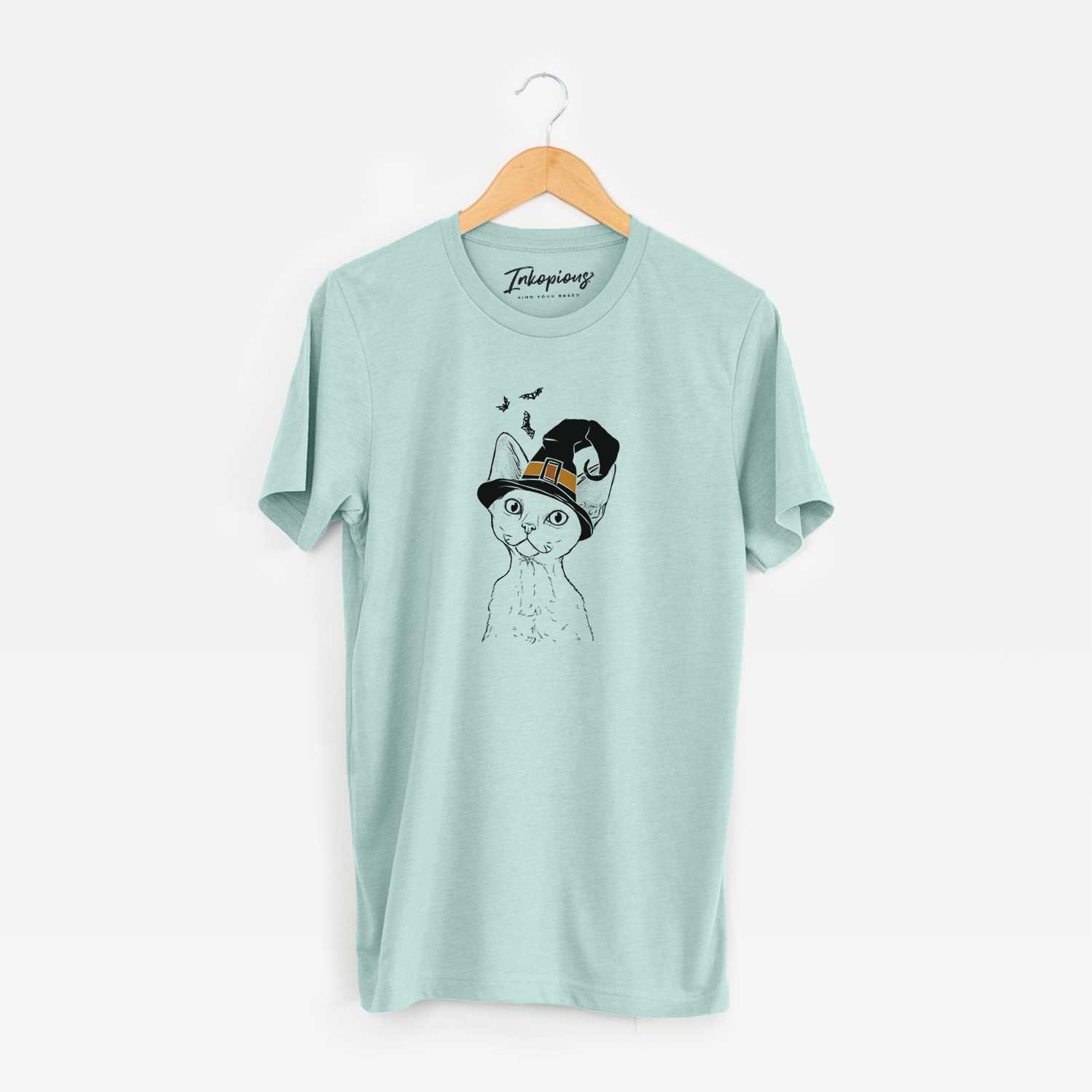 Hand-drawn sketch of Ripley the Devon Rex Cat wearing a witch hat on a Heather Sage Unisex crewneck