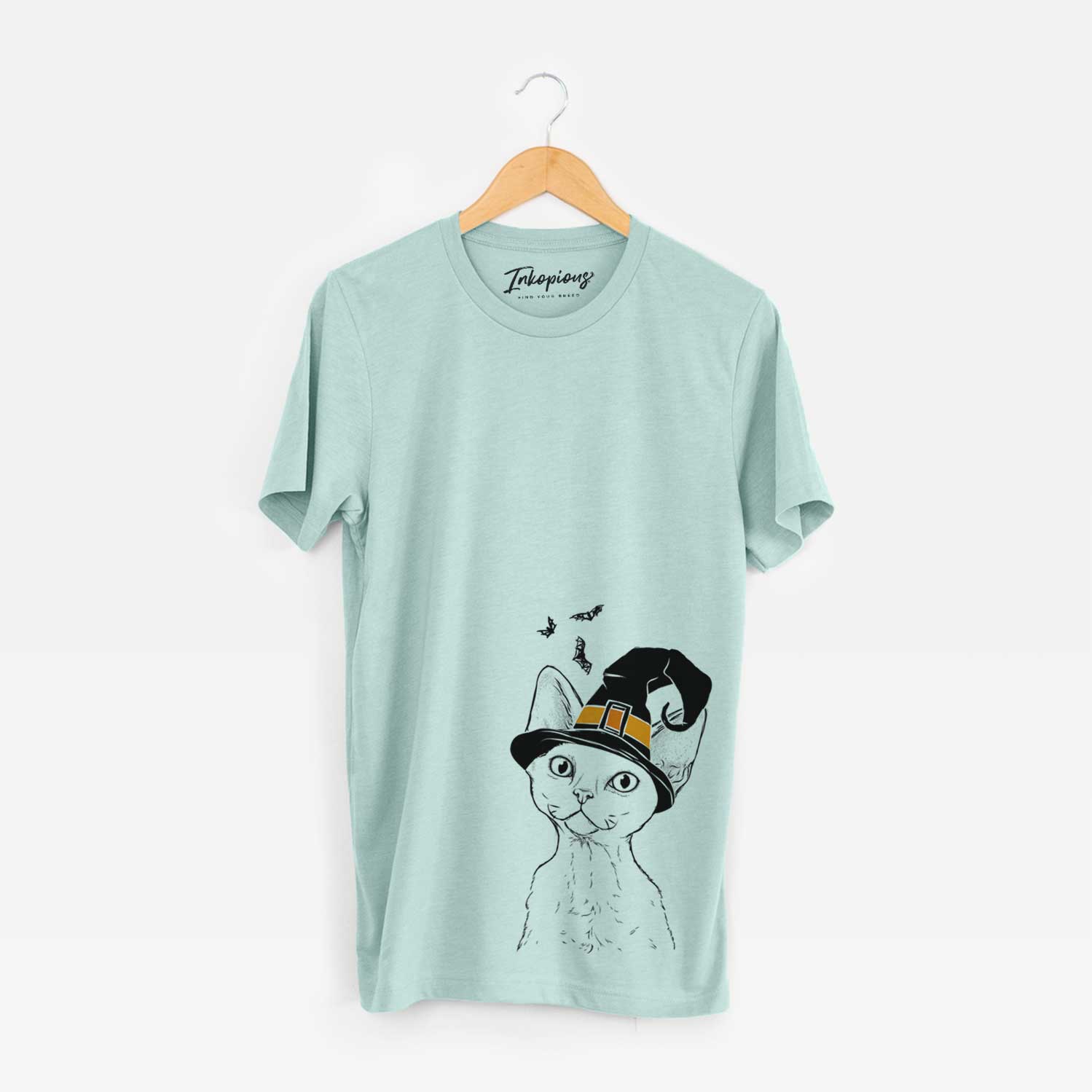 Hand-drawn sketch of Ripley the Devon Rex Cat wearing a witch hat on a Heather Sage Unisex crewneck