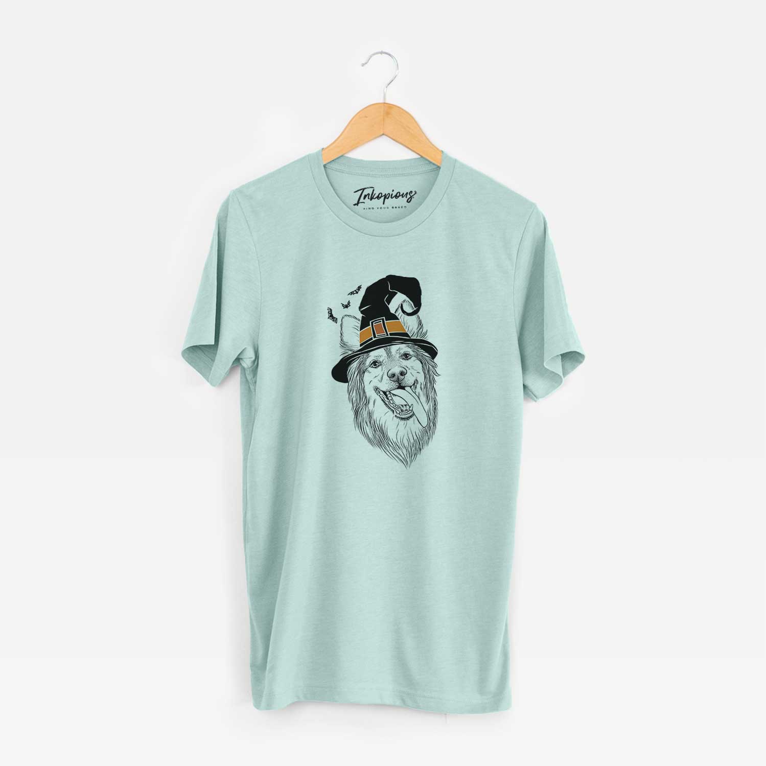 Hand-drawn sketch of Rosalie the German Shepherd Mix wearing a witch hat on a Heather Sage Unisex crewneck