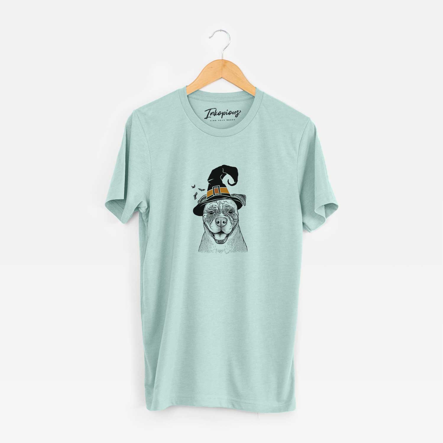 Hand-drawn sketch of Rufus the American Bulldog wearing a witch hat on a Heather Sage Unisex crewneck
