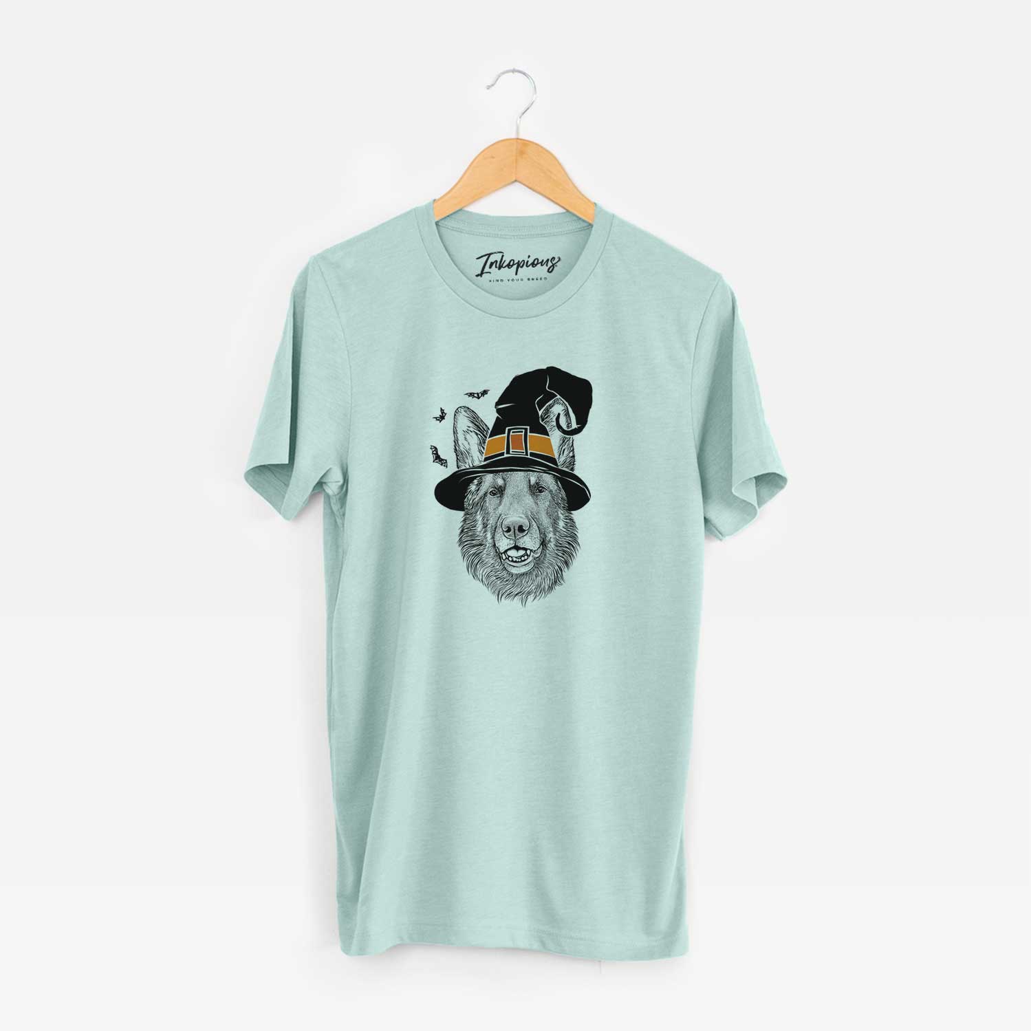 Hand-drawn sketch of Sammie the German Shepherd wearing a witch hat on a Heather Sage Unisex crewneck