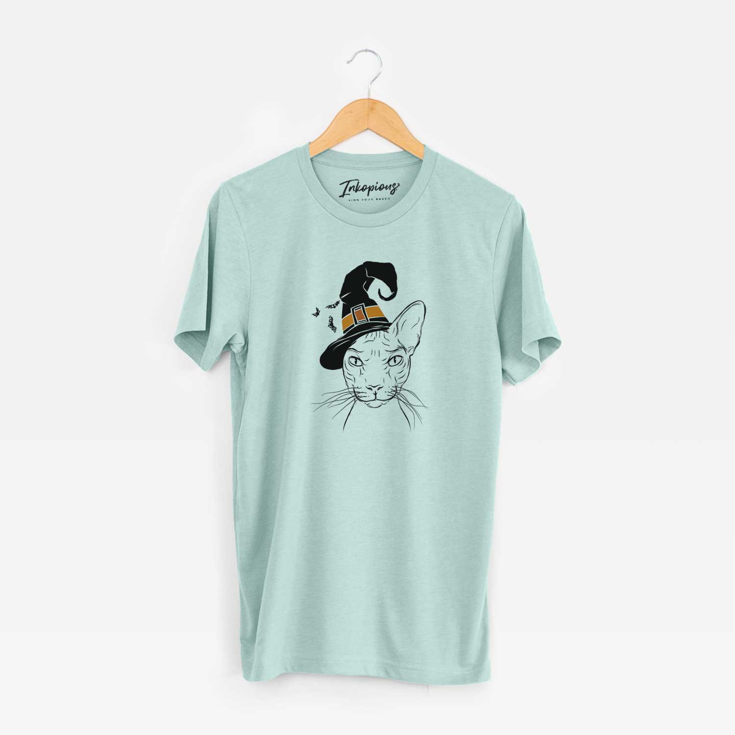 Hand-drawn sketch of Sammy the Spinx Cat wearing a witch hat on a Heather Sage Unisex crewneck