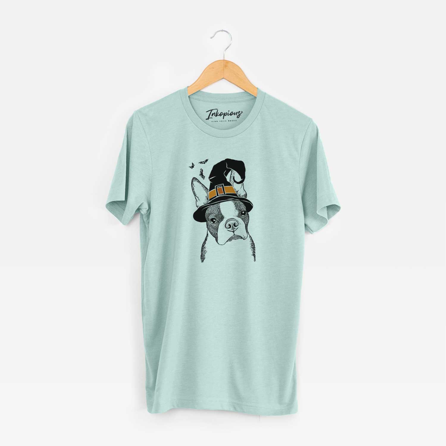 Hand-drawn sketch of Samuel the Boston Terrier wearing a witch hat on a Heather Sage Unisex crewneck
