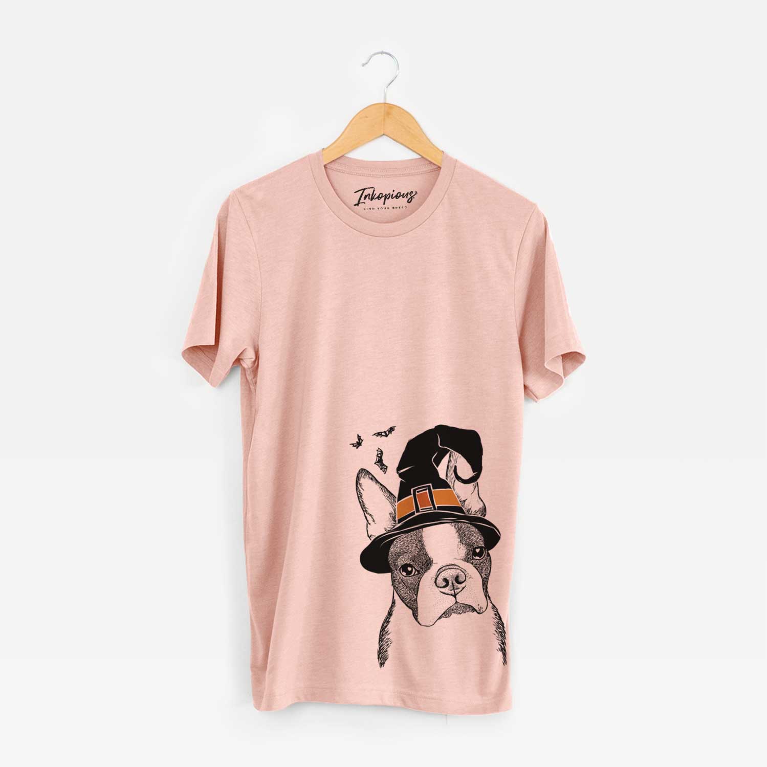 Hand-drawn sketch of Samuel the Boston Terrier wearing a witch hat on a Peach Unisex crewneck