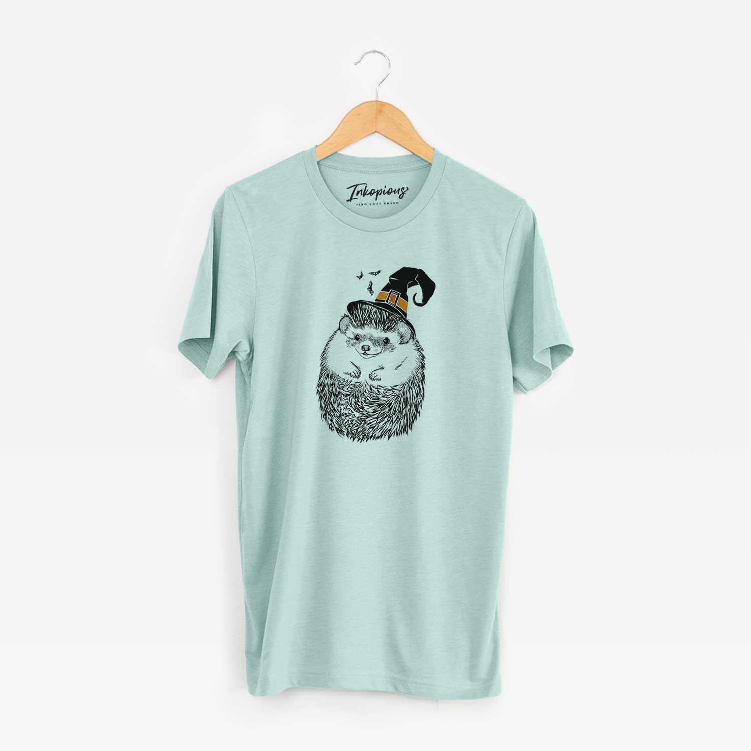 Hand-drawn sketch of Sid the Hedgehog wearing a witch hat on a Heather Sage Unisex crewneck