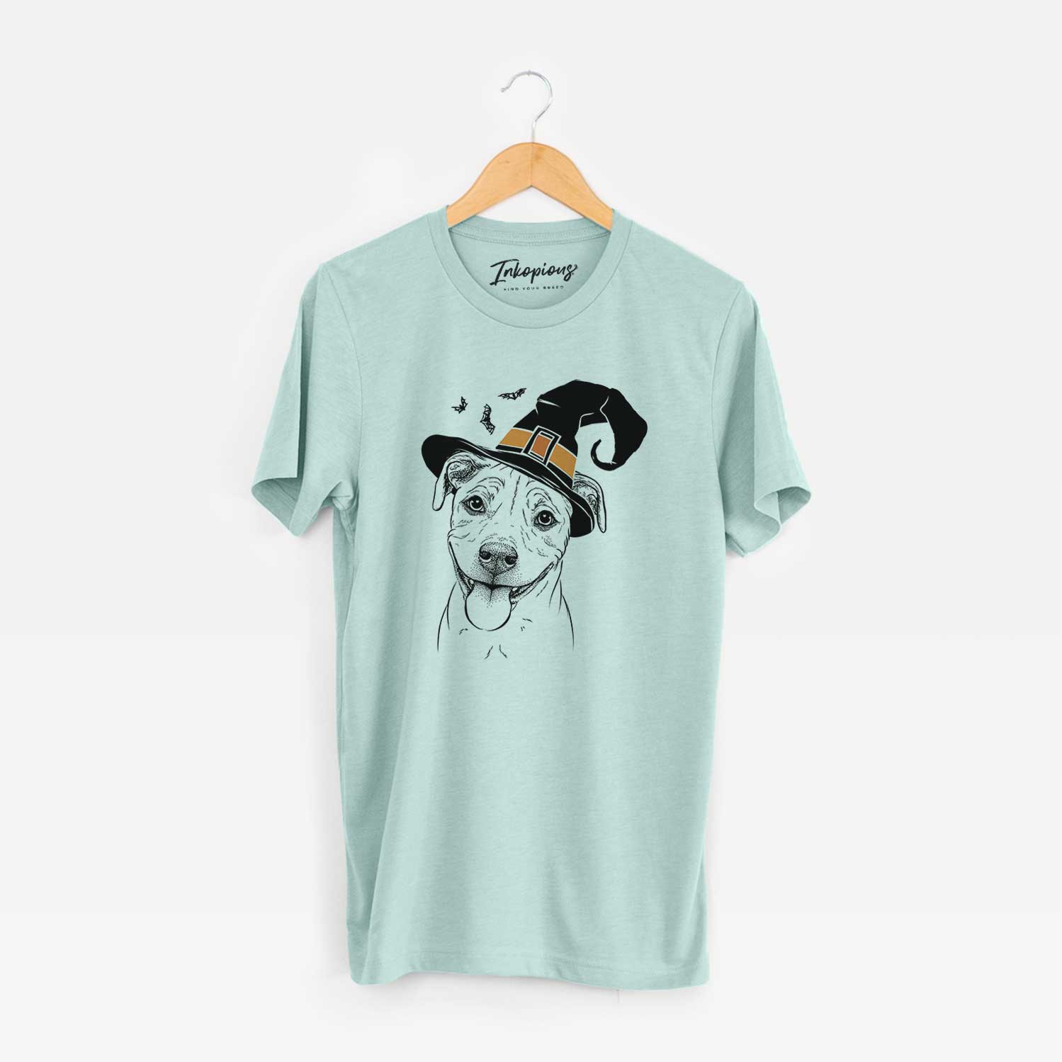 Hand-drawn sketch of Skye the Pitweiler wearing a witch hat on a Heather Sage Unisex crewneck