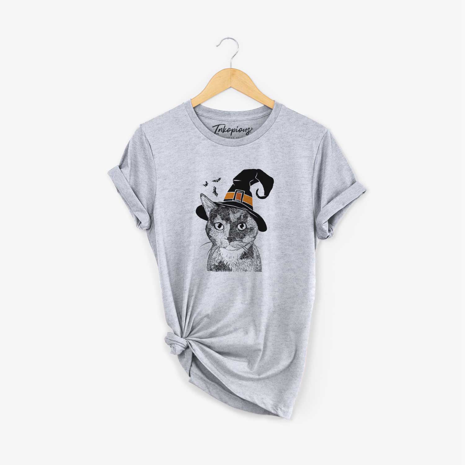 Hand-drawn sketch of Spooky Kitty the Tortoiseshell Cat wearing a witch hat on a Grey Unisex crewneck
