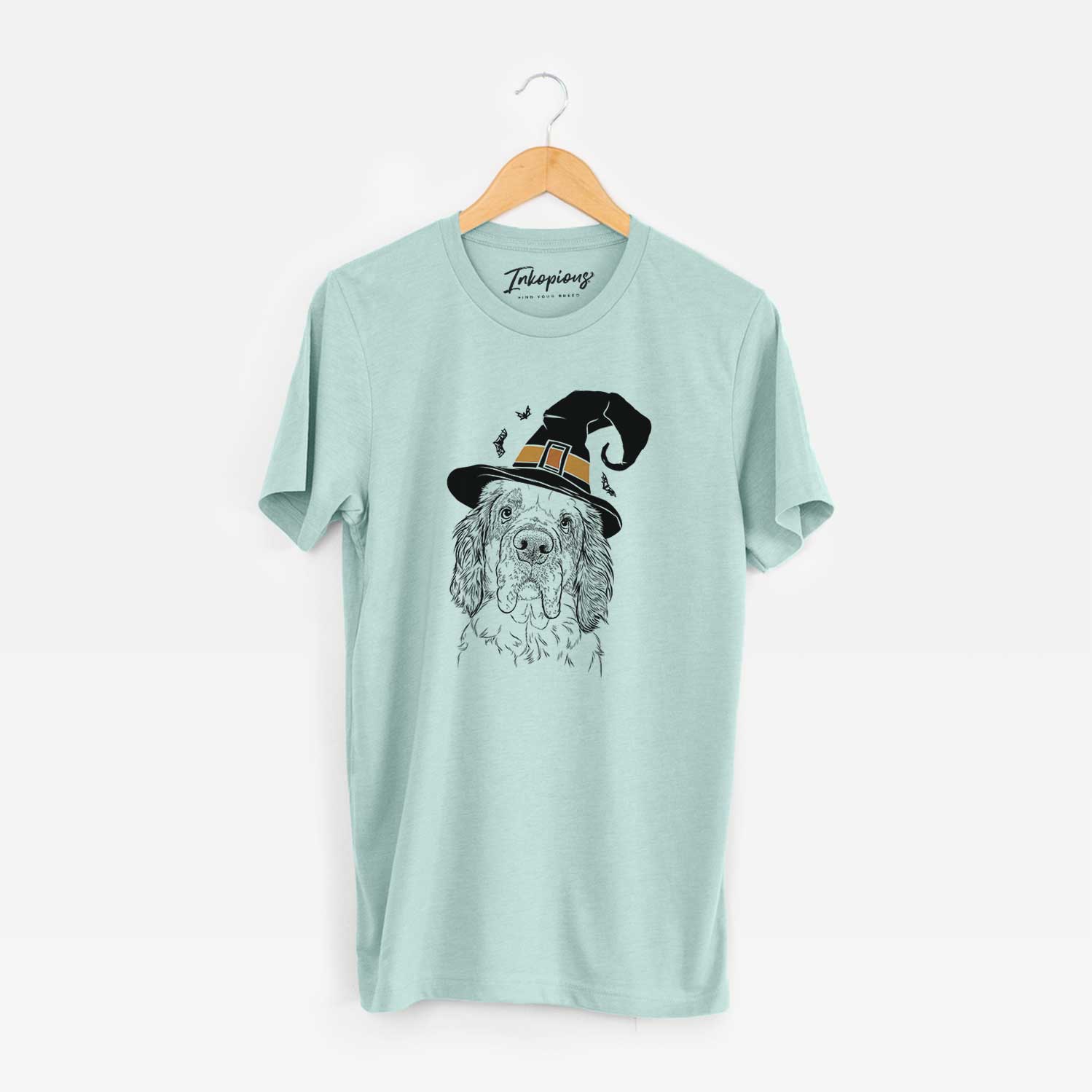 Hand-drawn sketch of Sully the Clumber Spaniel wearing a witch hat on a Heather Sage Unisex crewneck