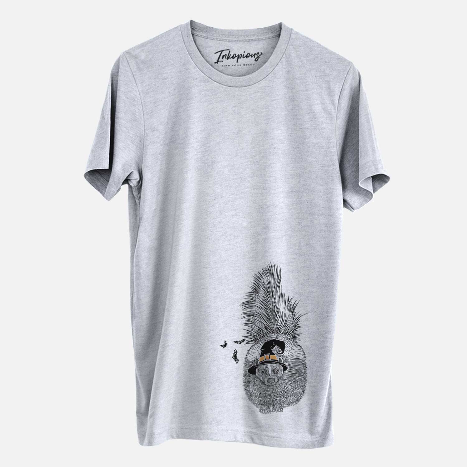 Hand-drawn sketch of Tibbs the Skunk wearing a witch hat on a Grey Unisex crewneck