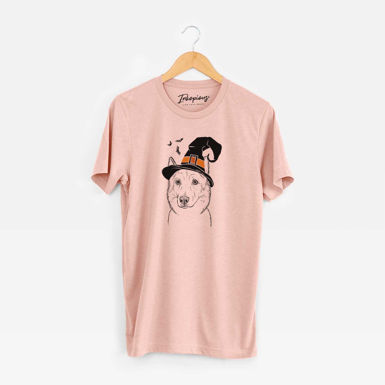 Hand-drawn sketch of Vox the Siberian Husky wearing a witch hat on a Peach Unisex crewneck