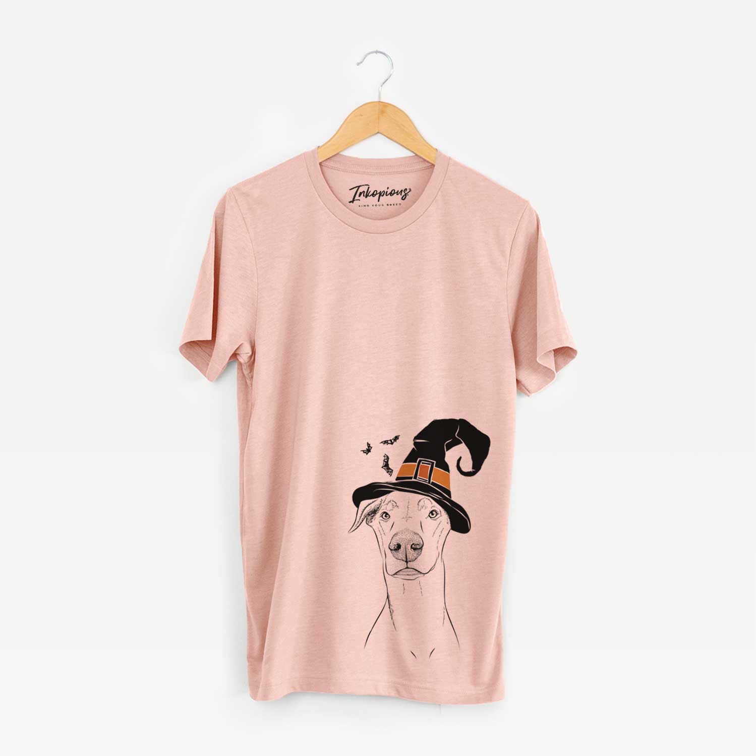 Hand-drawn sketch of Walter the White Doberman Rescue wearing a witch hat on a Peach Unisex crewneck