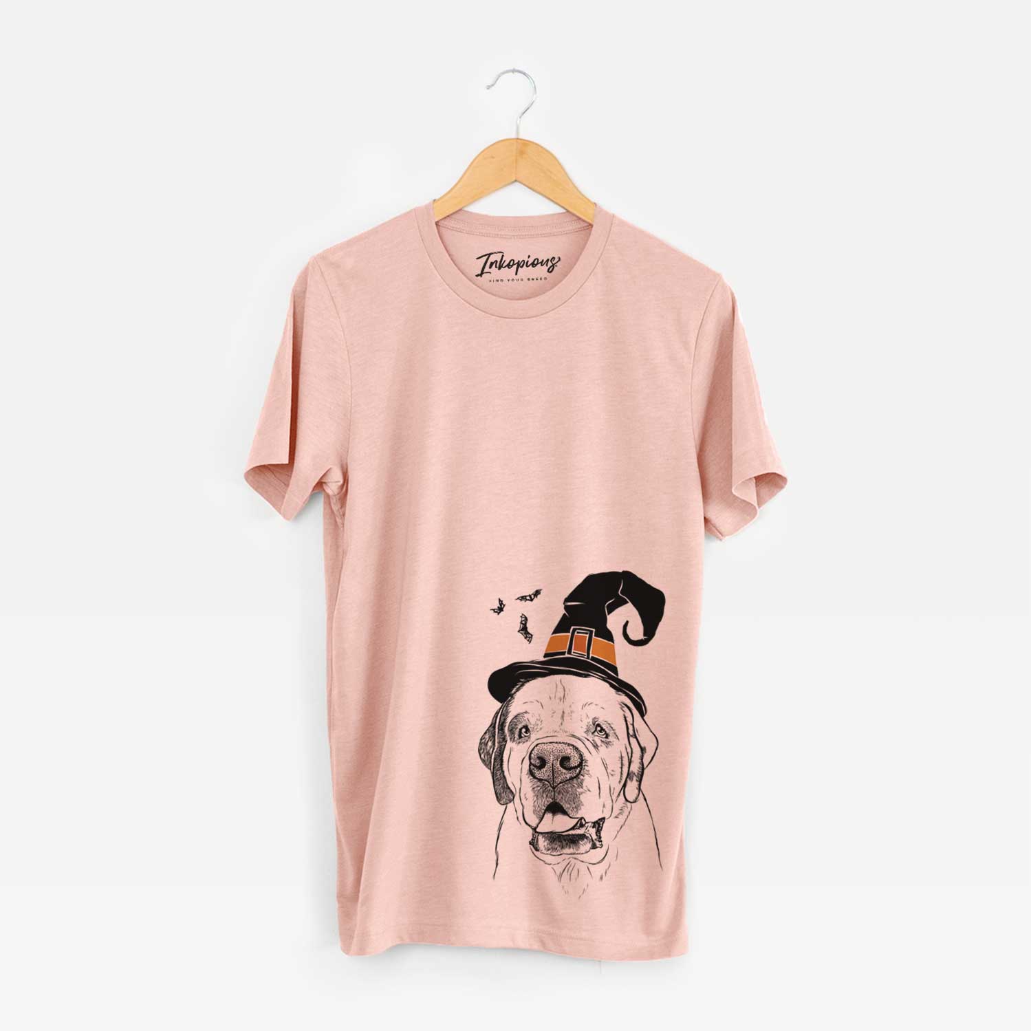 Hand-drawn sketch of Wendy the Saint Bernard wearing a witch hat on a Peach Unisex crewneck