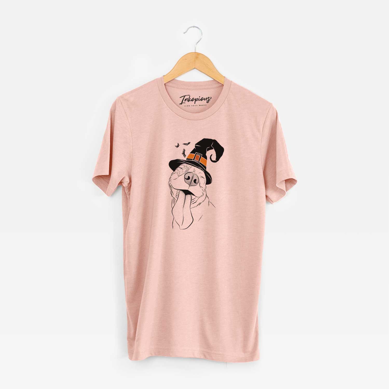 Hand-drawn sketch of Xena the American Staffordshire Terrier wearing a witch hat on a Peach Unisex crewneck