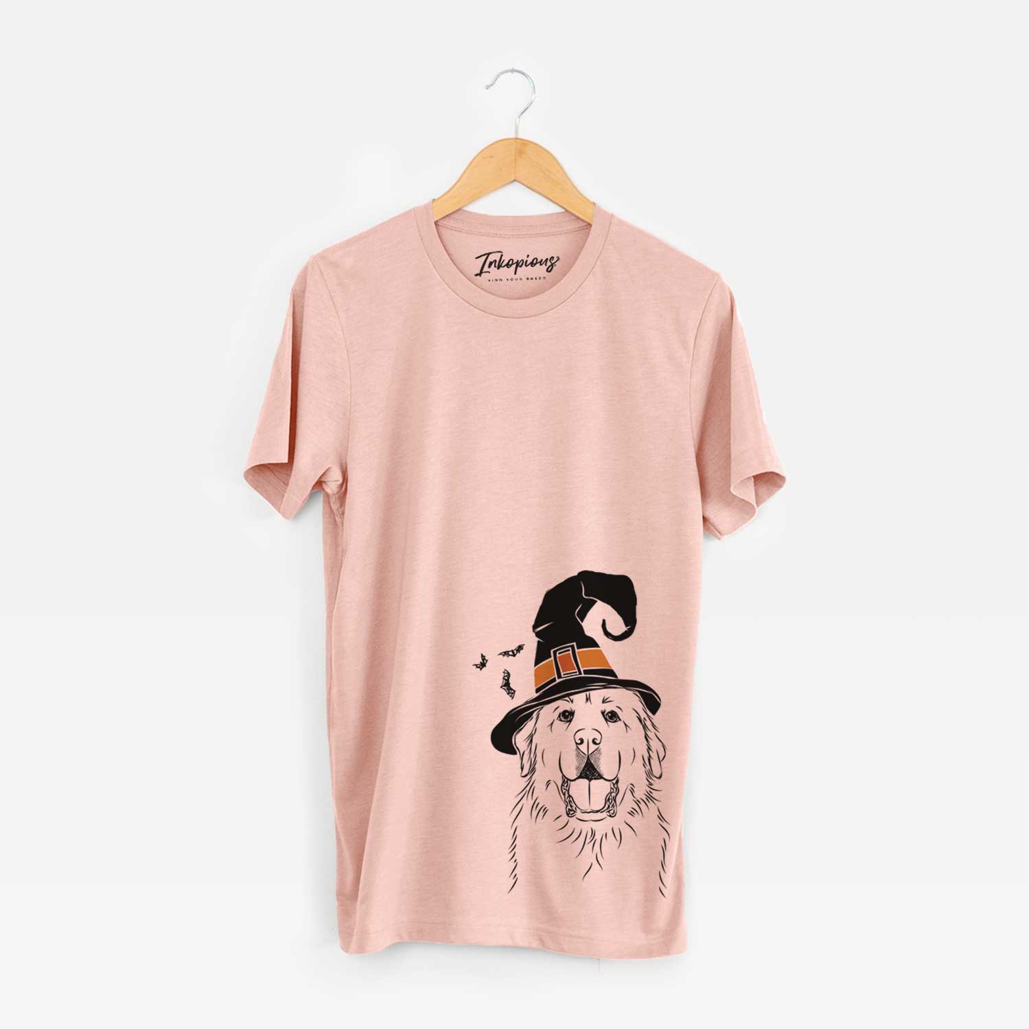 Hand-drawn sketch of Zeus the Great Pyrenees wearing a witch hat on a Peach Unisex crewneck