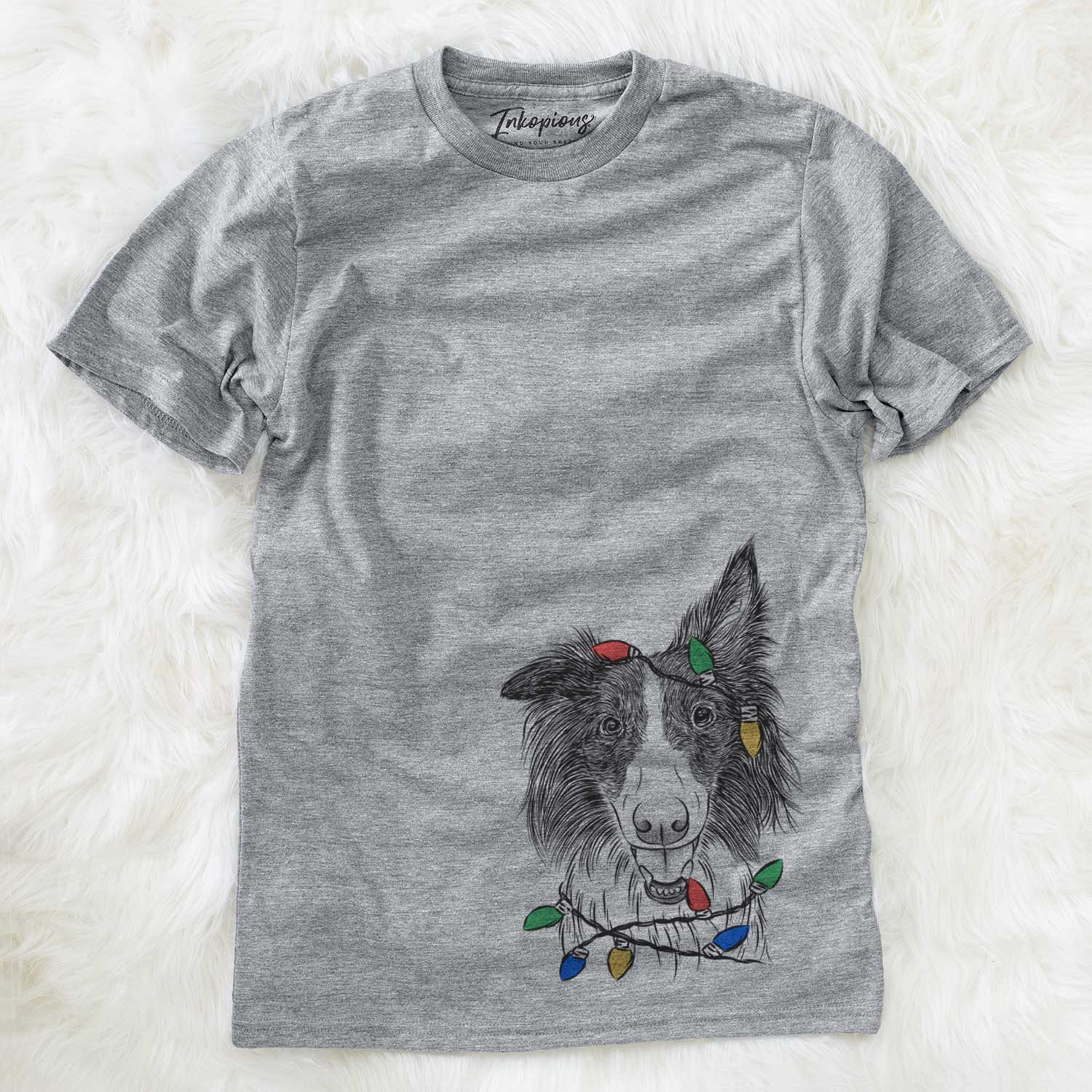 Hand-drawn sketch of Archie the Silken Windhound wrapped in Christmas lights on a Grey Unisex crewneck