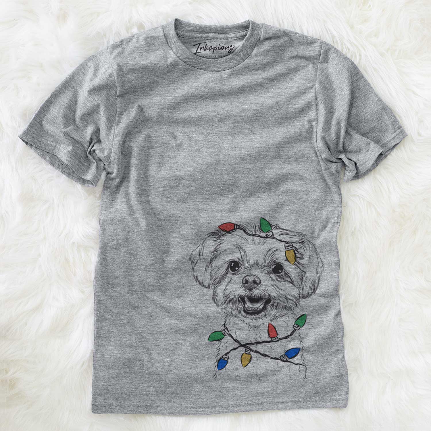 Hand-drawn sketch of Aspen the Morkie wrapped in Christmas lights on a Grey Unisex crewneck
