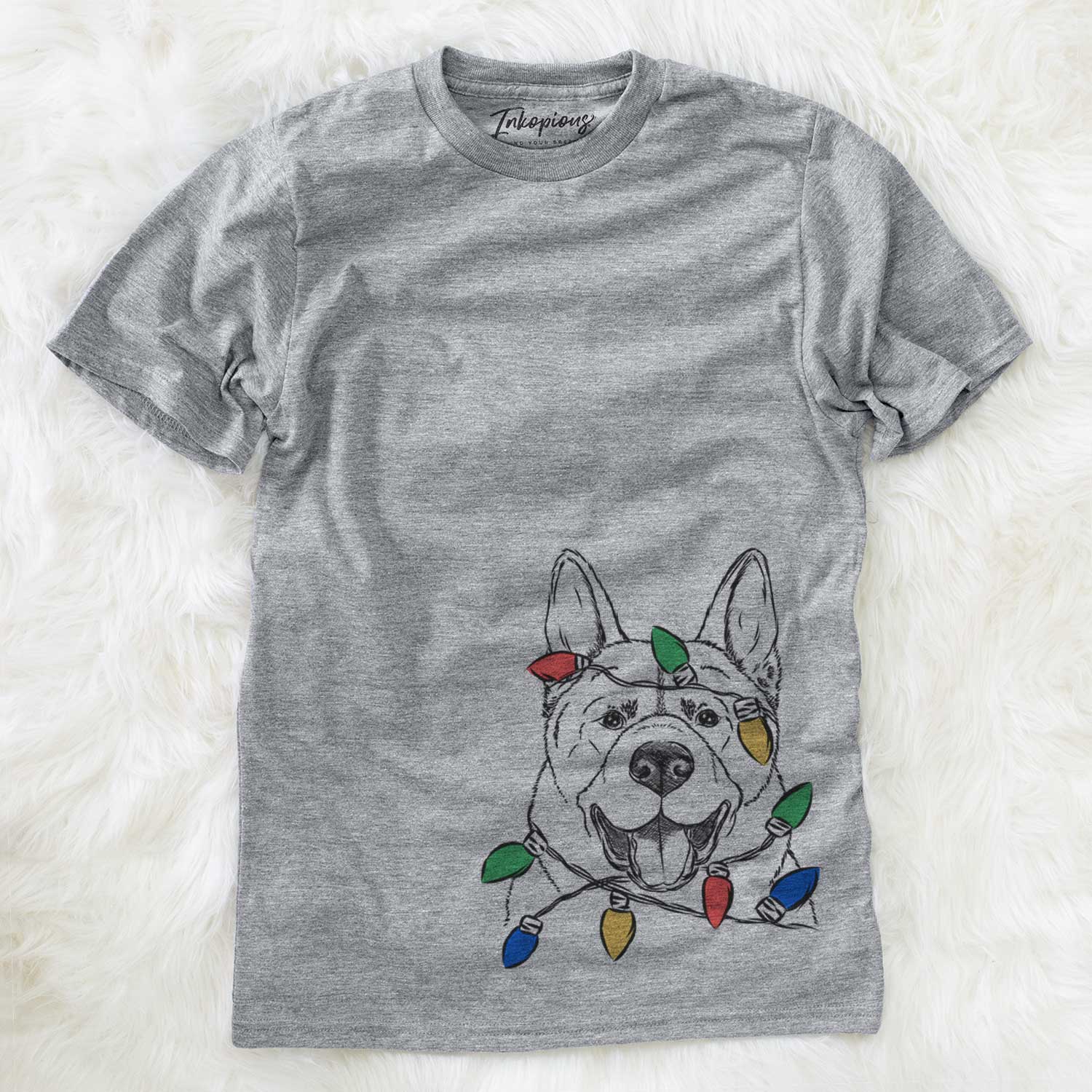 Hand-drawn sketch of Baku the Akita wrapped in Christmas lights on a Grey Unisex crewneck