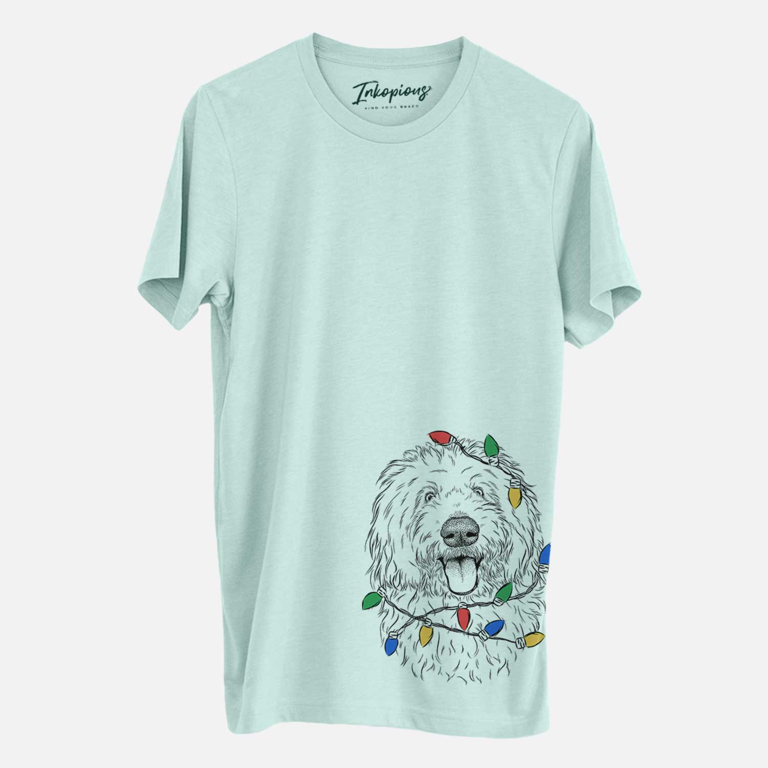 Hand-drawn sketch of Barry the Old English Sheepdog wrapped in Christmas lights on a Heather Sage Unisex crewneck