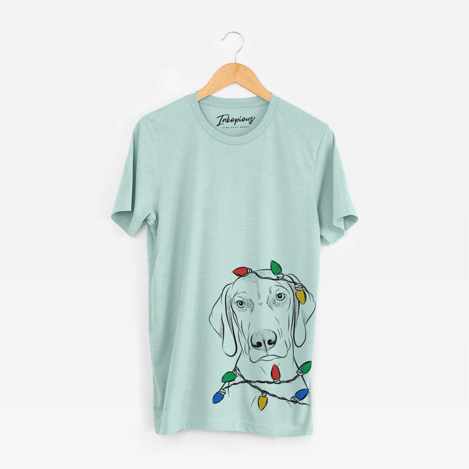 Hand-drawn sketch of Benelli the Vizsla wrapped in Christmas lights on a Heather Sage Unisex crewneck