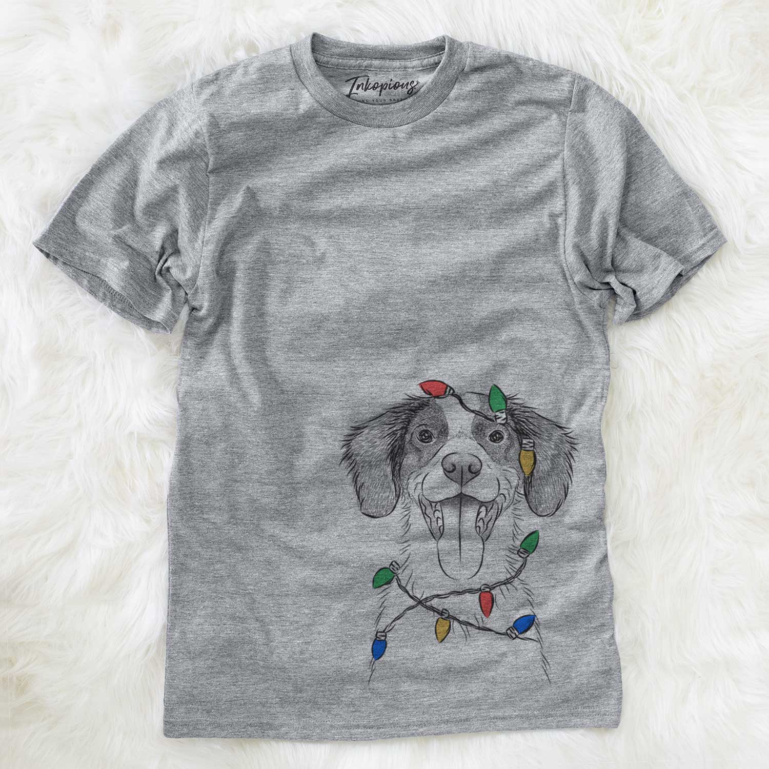 Hand-drawn sketch of Birdie the Brittany wrapped in Christmas lights on a Grey Unisex crewneck
