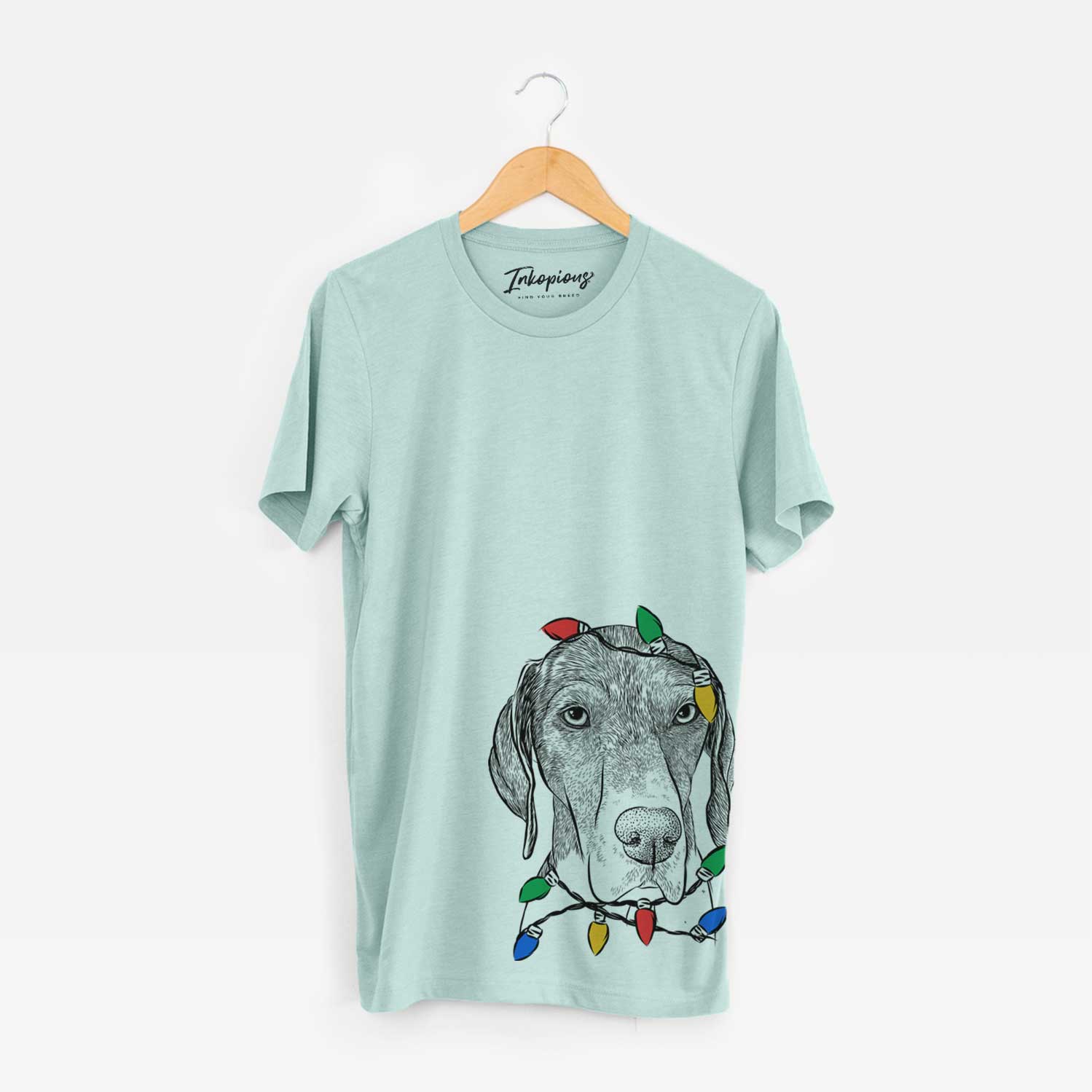 Hand-drawn sketch of Bohdi the German Shorthaired Pointer wrapped in Christmas lights on a Heather Sage Unisex crewneck