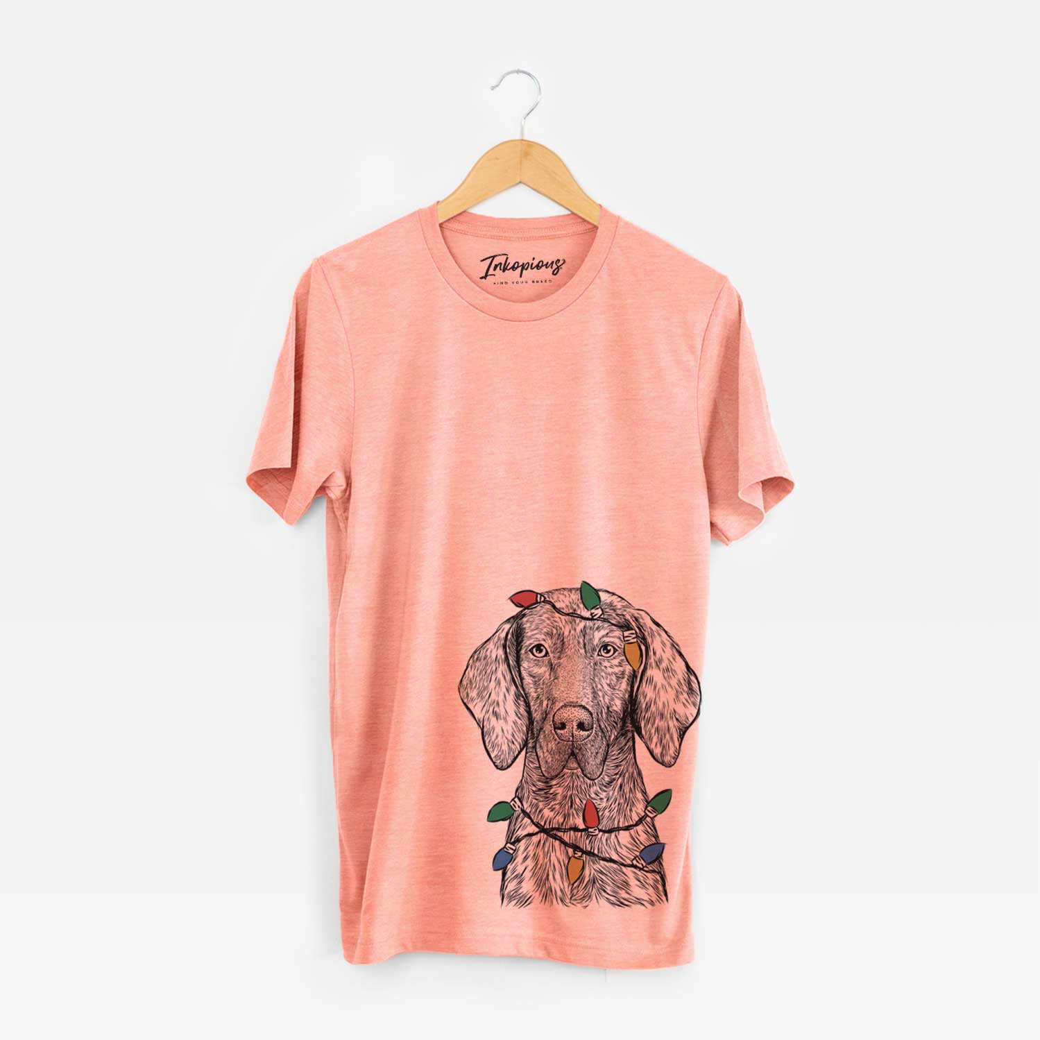 Hand-drawn sketch of Boone the Plott Hound wrapped in Christmas lights on a Sunset Unisex crewneck