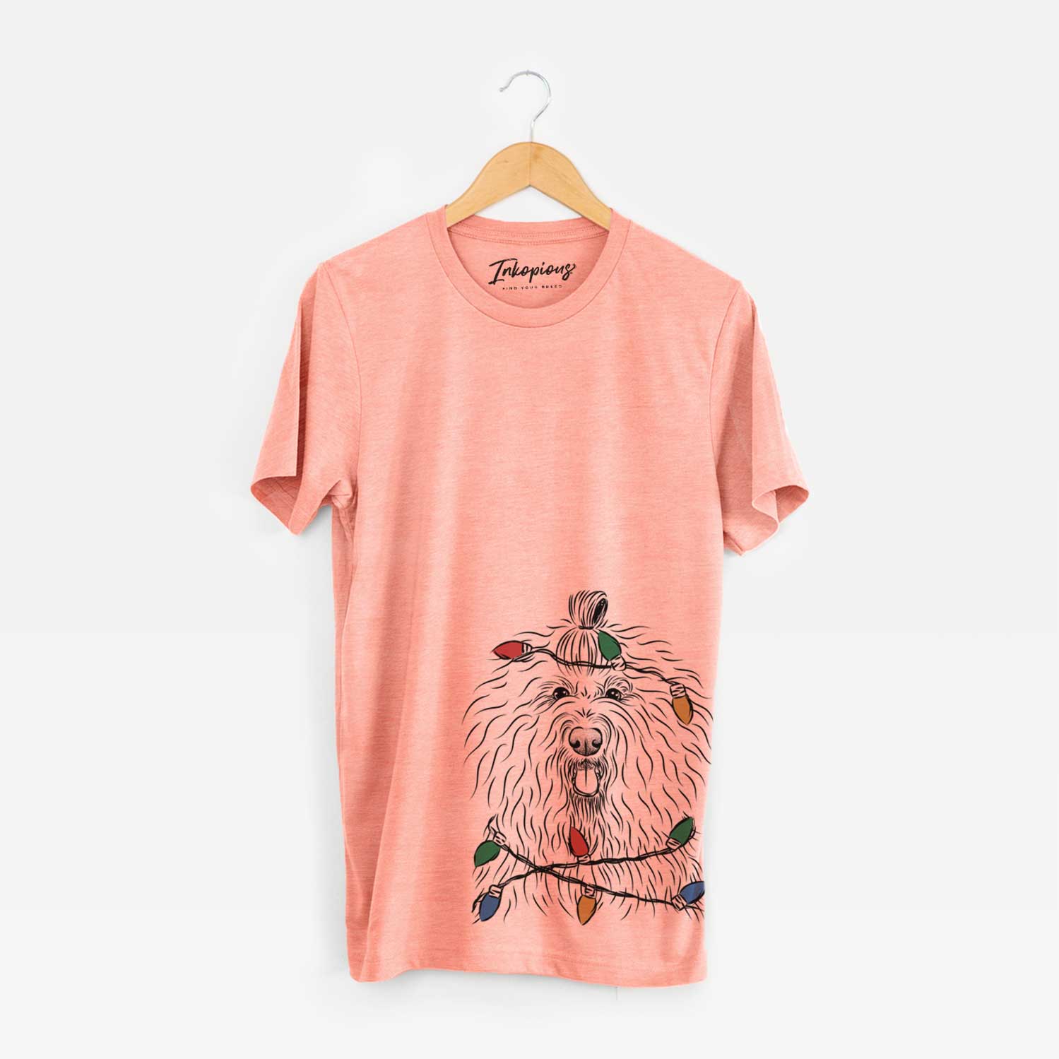Hand-drawn sketch of Brody the Old English Sheepdog wrapped in Christmas lights on a Sunset Unisex crewneck