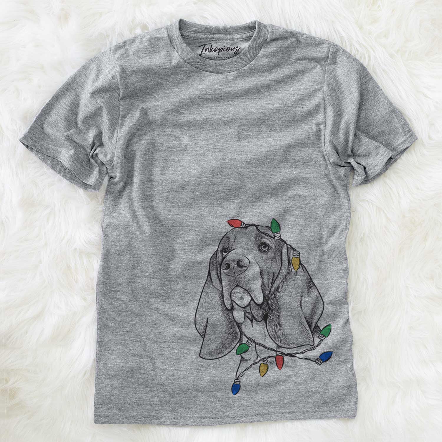 Hand-drawn sketch of Cooper the Basset Hound wrapped in Christmas lights on a Grey Unisex crewneck