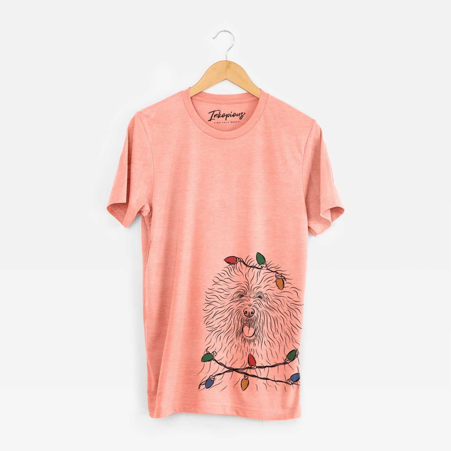 Hand-drawn sketch of Cozie the Old English Sheepdog wrapped in Christmas lights on a Sunset Unisex crewneck