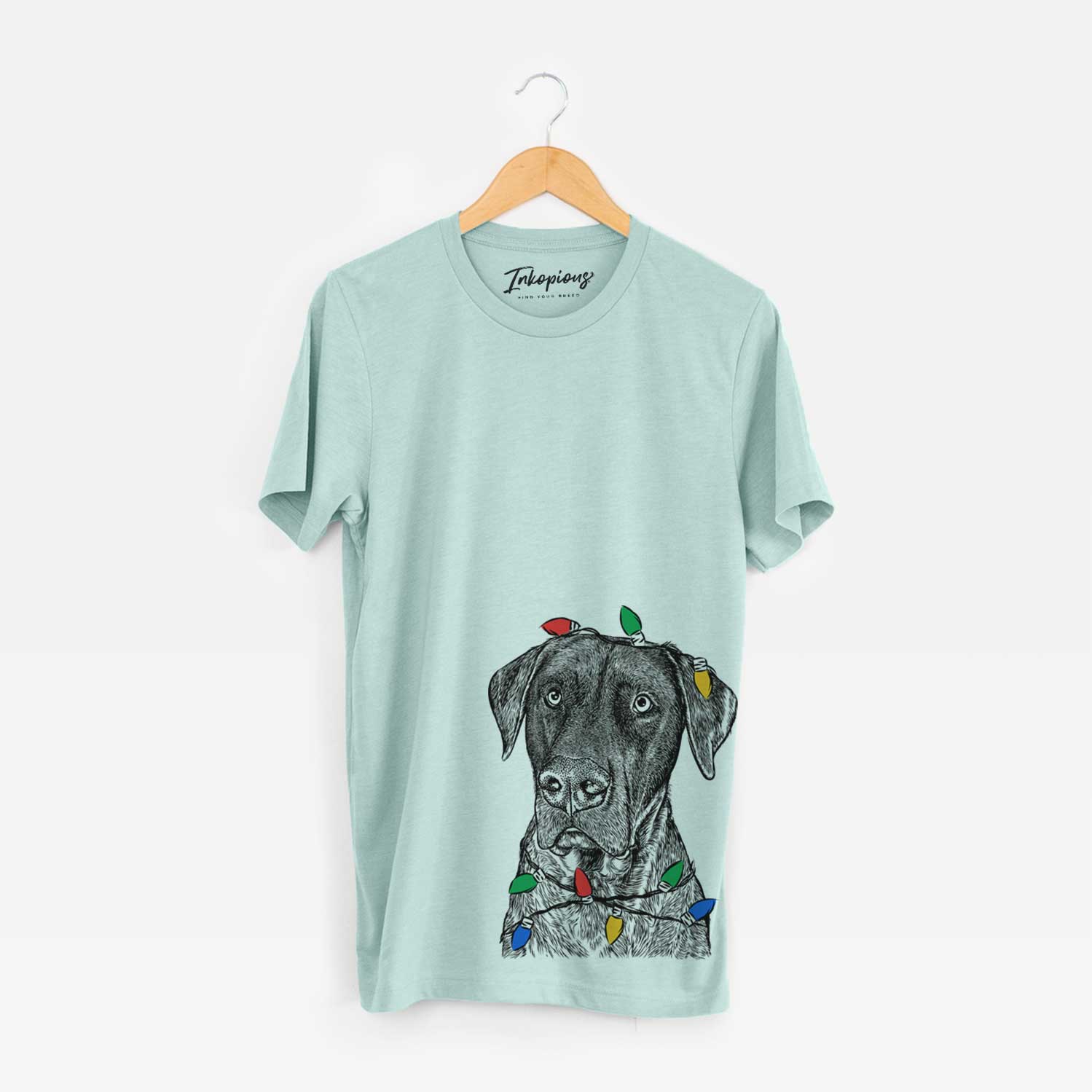 Hand-drawn sketch of David the Boxador wrapped in Christmas lights on a Heather Sage Unisex crewneck