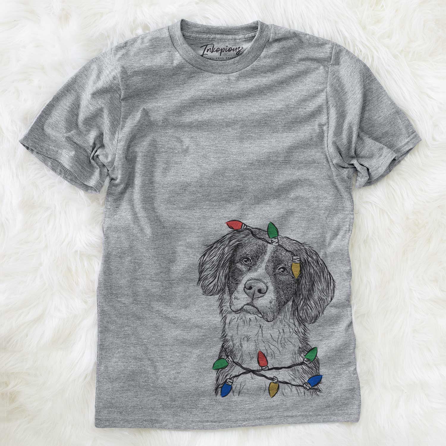 Hand-drawn sketch of Dulce the Drentsche Patrijshond wrapped in Christmas lights on a Grey Unisex crewneck