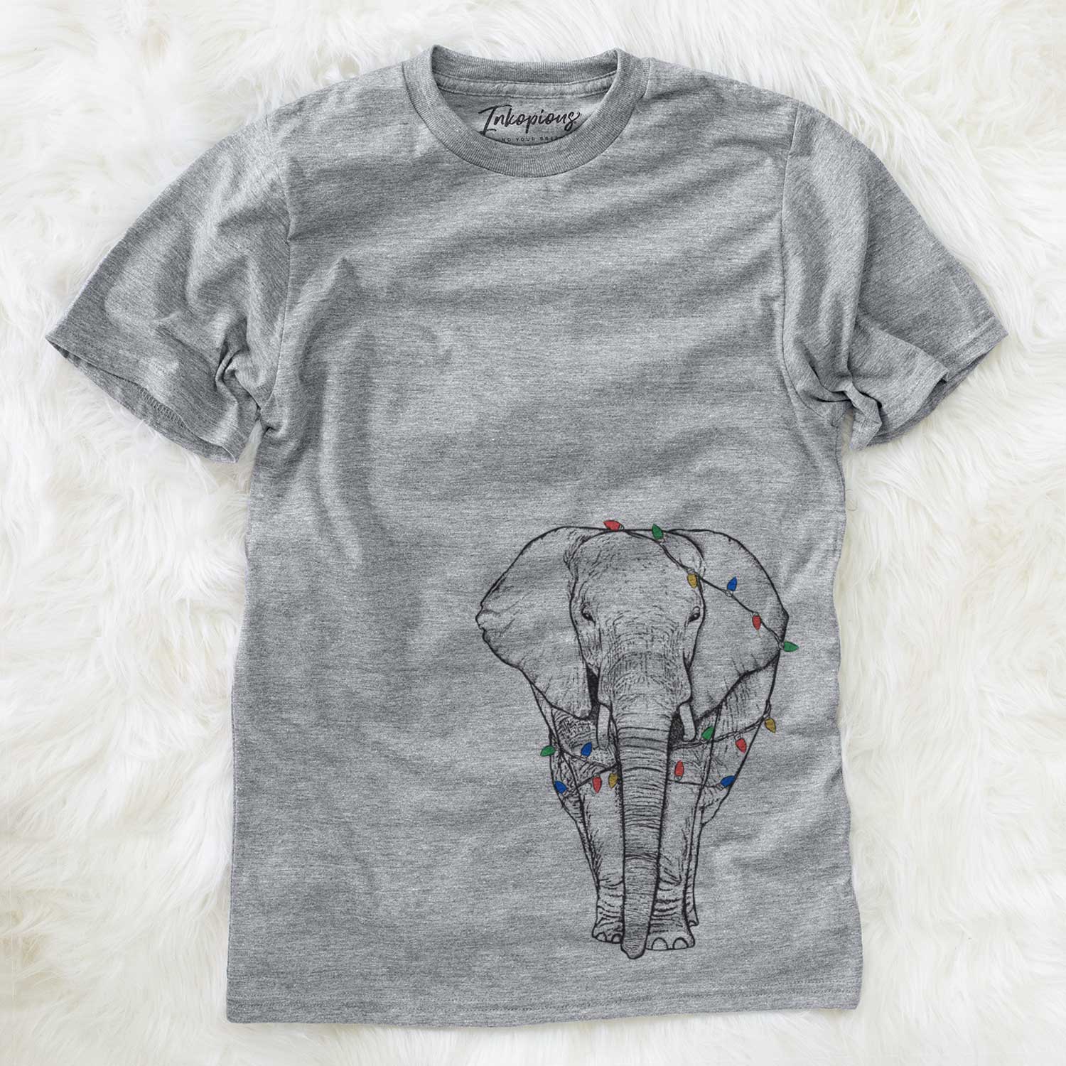 Hand-drawn sketch of Ella the Elephant wrapped in Christmas lights on a Grey Unisex crewneck