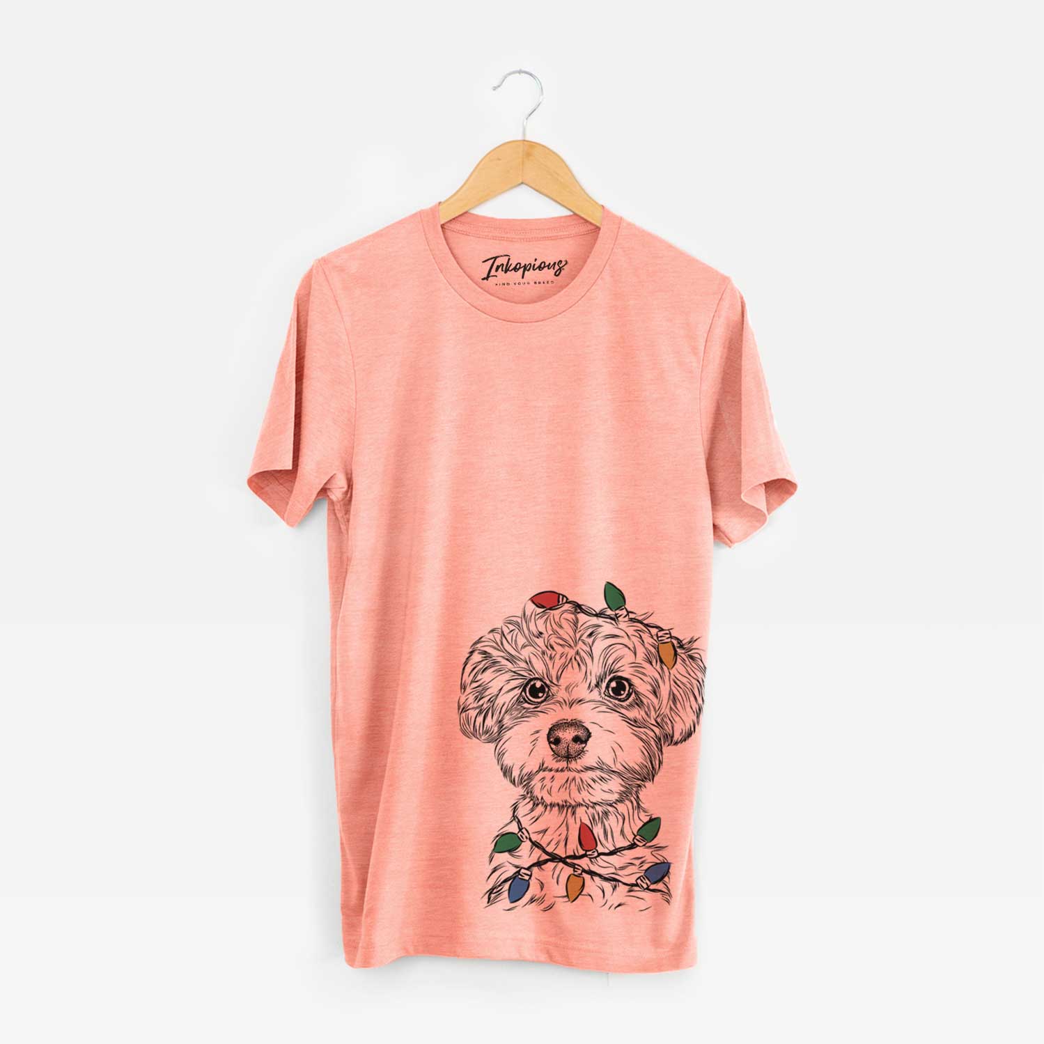 Hand-drawn sketch of Elliott the Yorkiepoo wrapped in Christmas lights on a Sunset Unisex crewneck