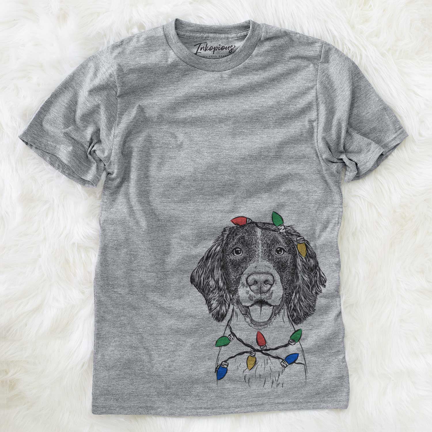 Hand-drawn sketch of Ever the English Springer Spaniel wrapped in Christmas lights on a Grey Unisex crewneck