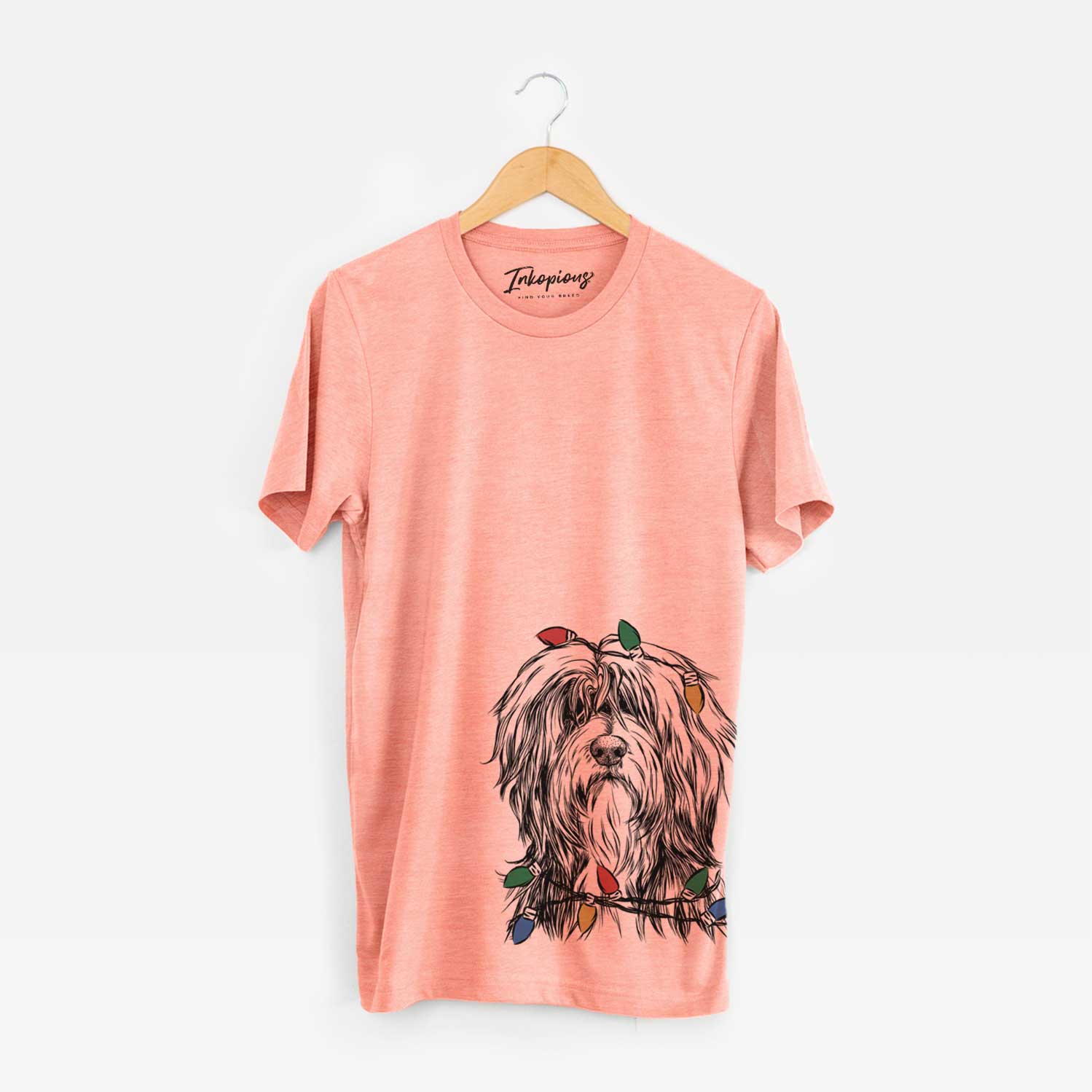 Hand-drawn sketch of Fiji the Polish Lowland Sheepdog wrapped in Christmas lights on a Sunset Unisex crewneck