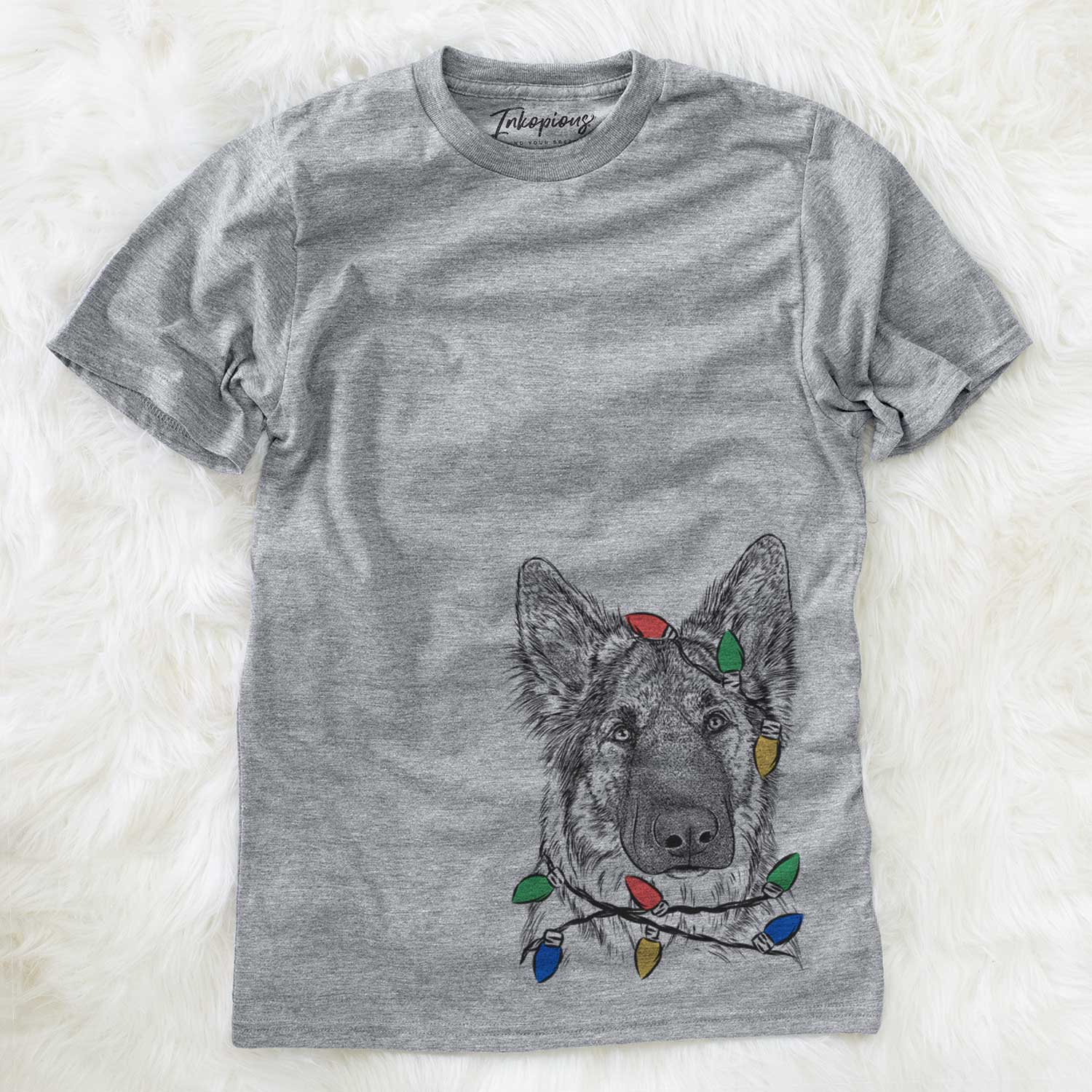 Hand-drawn sketch of Geddy the Shiloh Shepherd wrapped in Christmas lights on a Grey Unisex crewneck