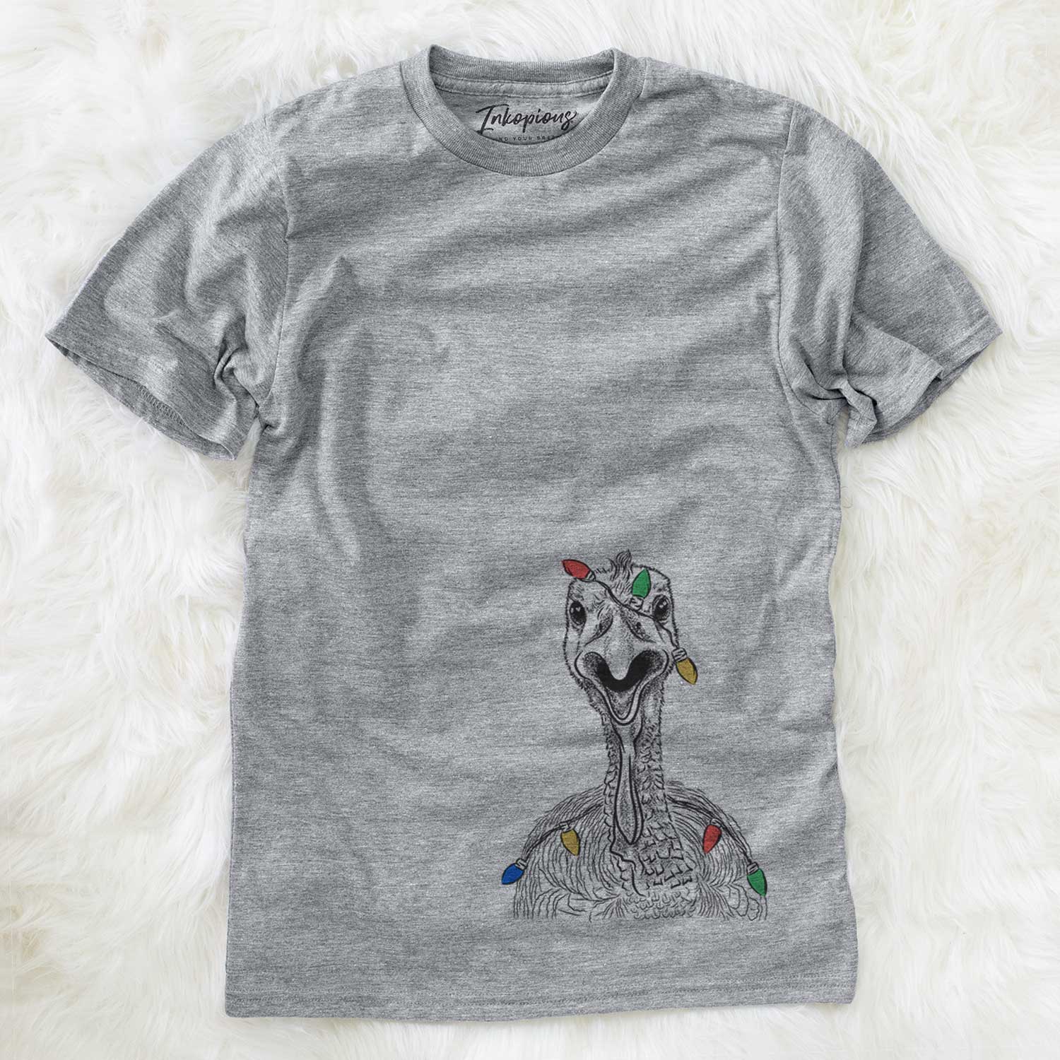 Hand-drawn sketch of Gobble the Turkey wrapped in Christmas lights on a Grey Unisex crewneck