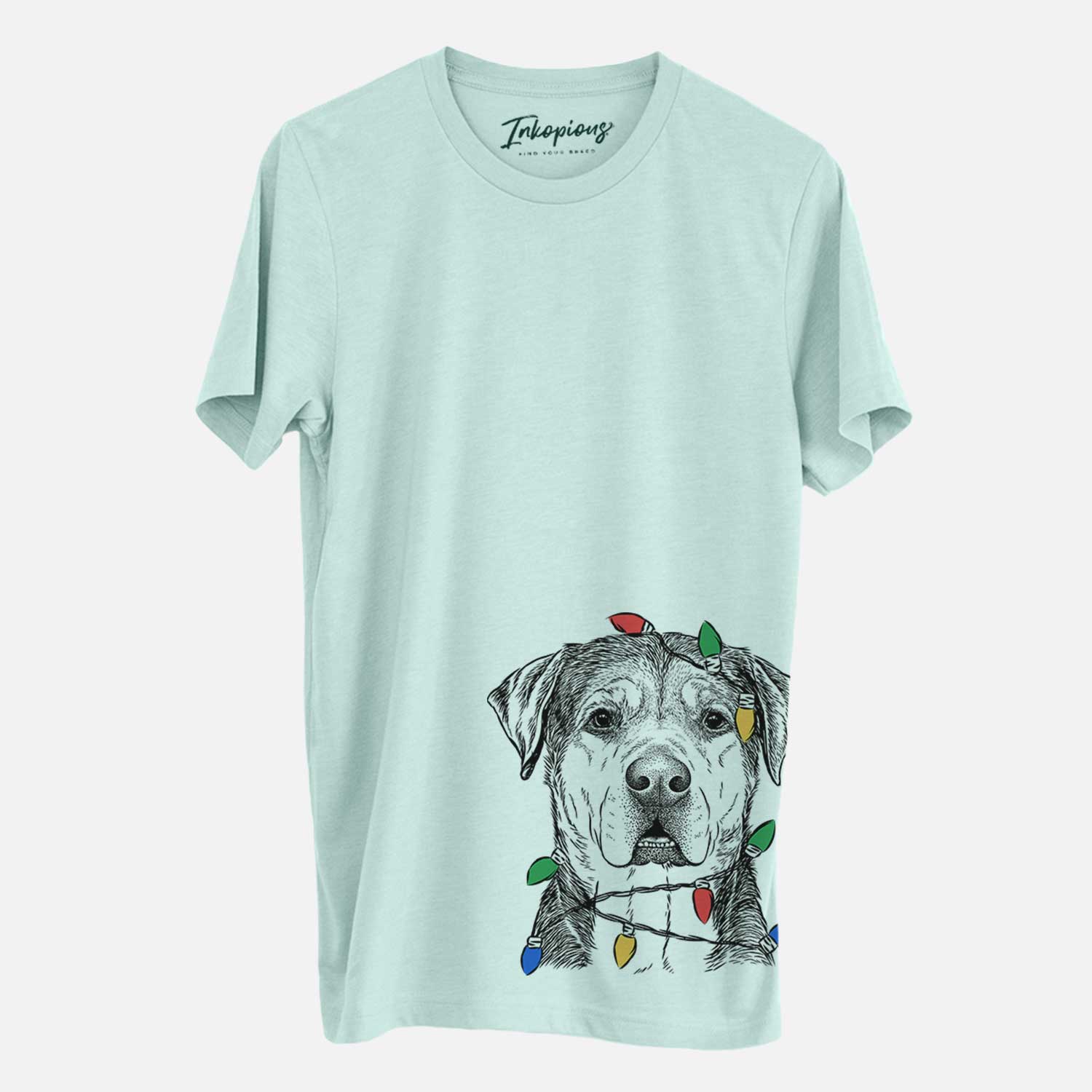 Hand-drawn sketch of Gus the Rottweiler Mix wrapped in Christmas lights on a Heather Sage Unisex crewneck