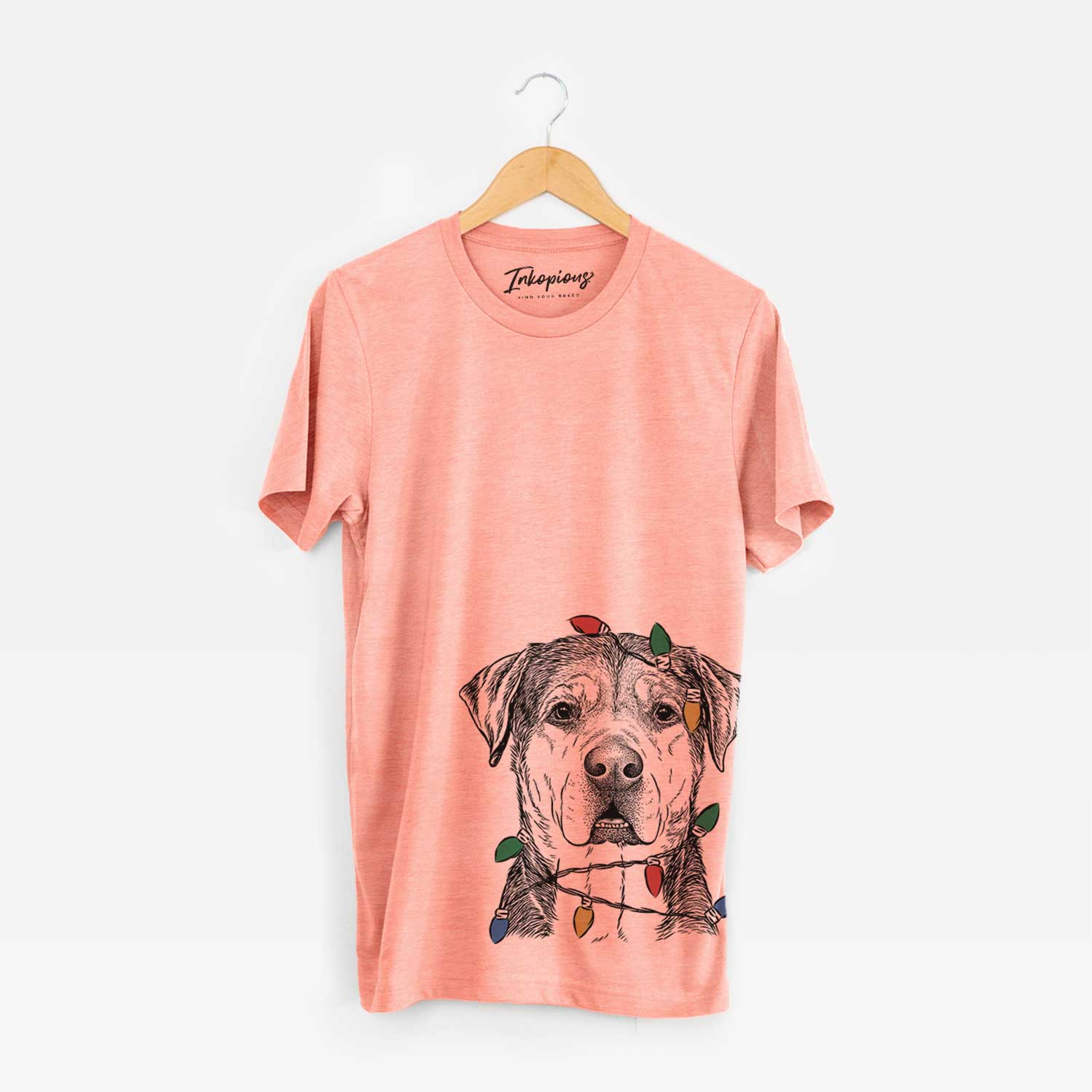 Hand-drawn sketch of Gus the Rottweiler Mix wrapped in Christmas lights on a Sunset Unisex crewneck
