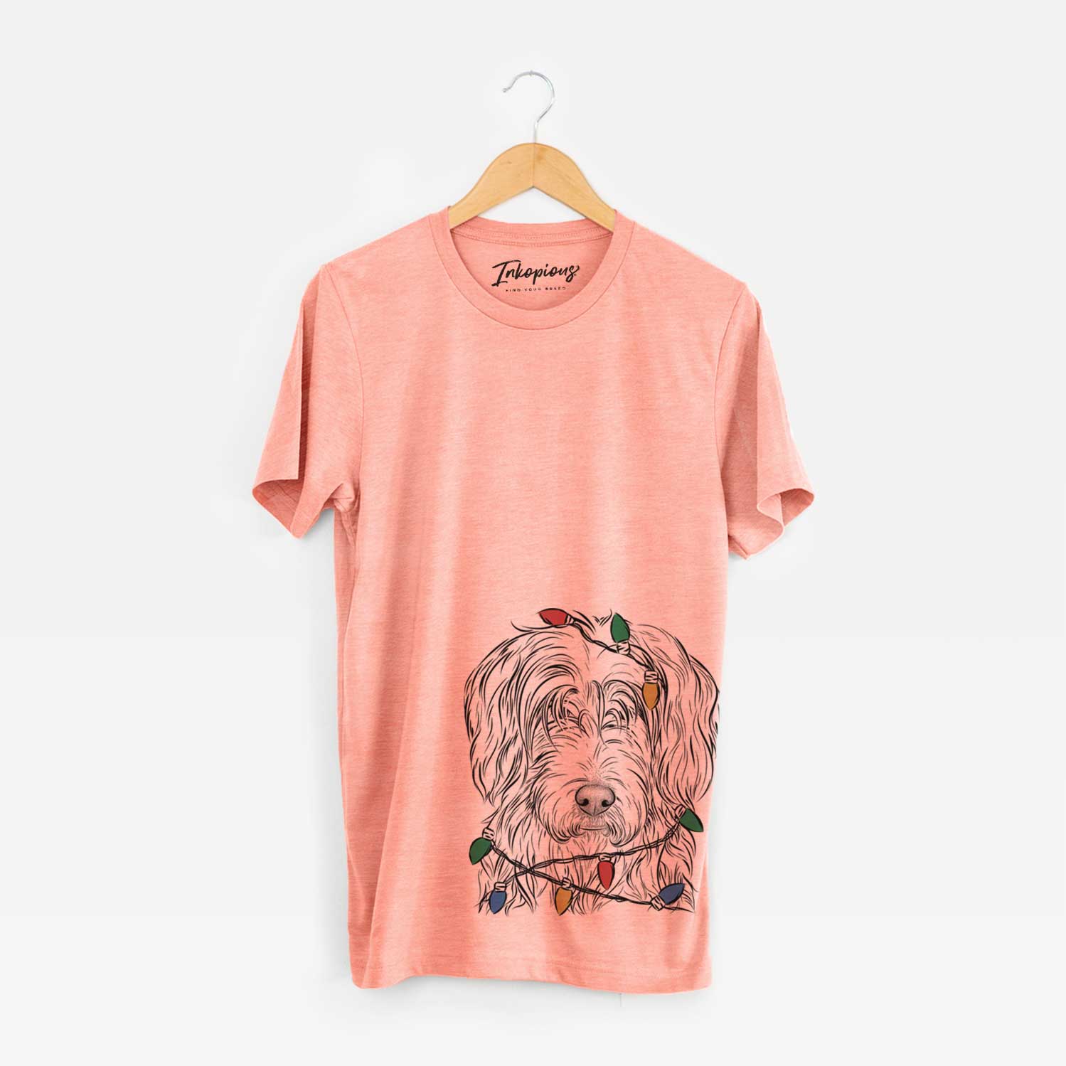 Hand-drawn sketch of Harry the Mixed Breed wrapped in Christmas lights on a Sunset Unisex crewneck