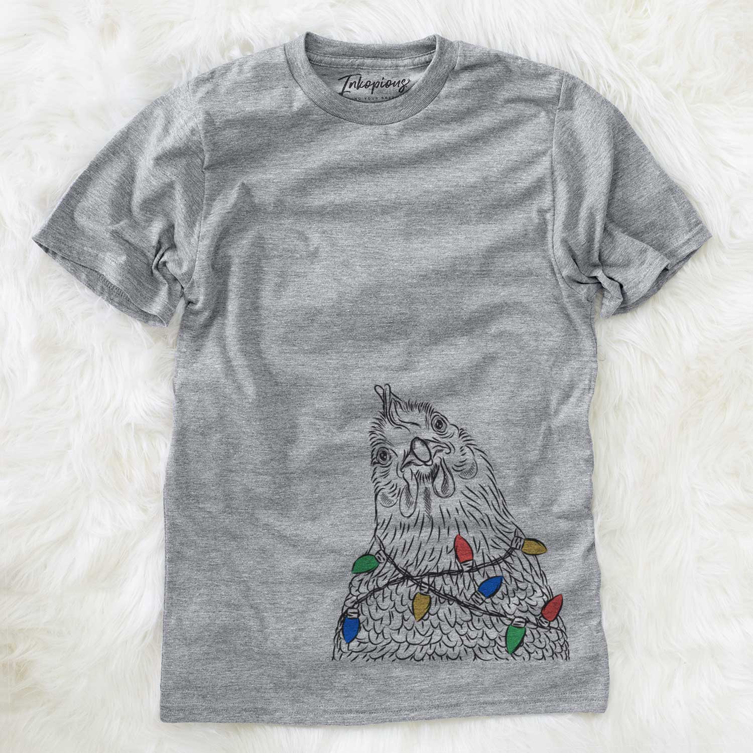 Hand-drawn sketch of Henrietta the Chicken wrapped in Christmas lights on a Grey Unisex crewneck