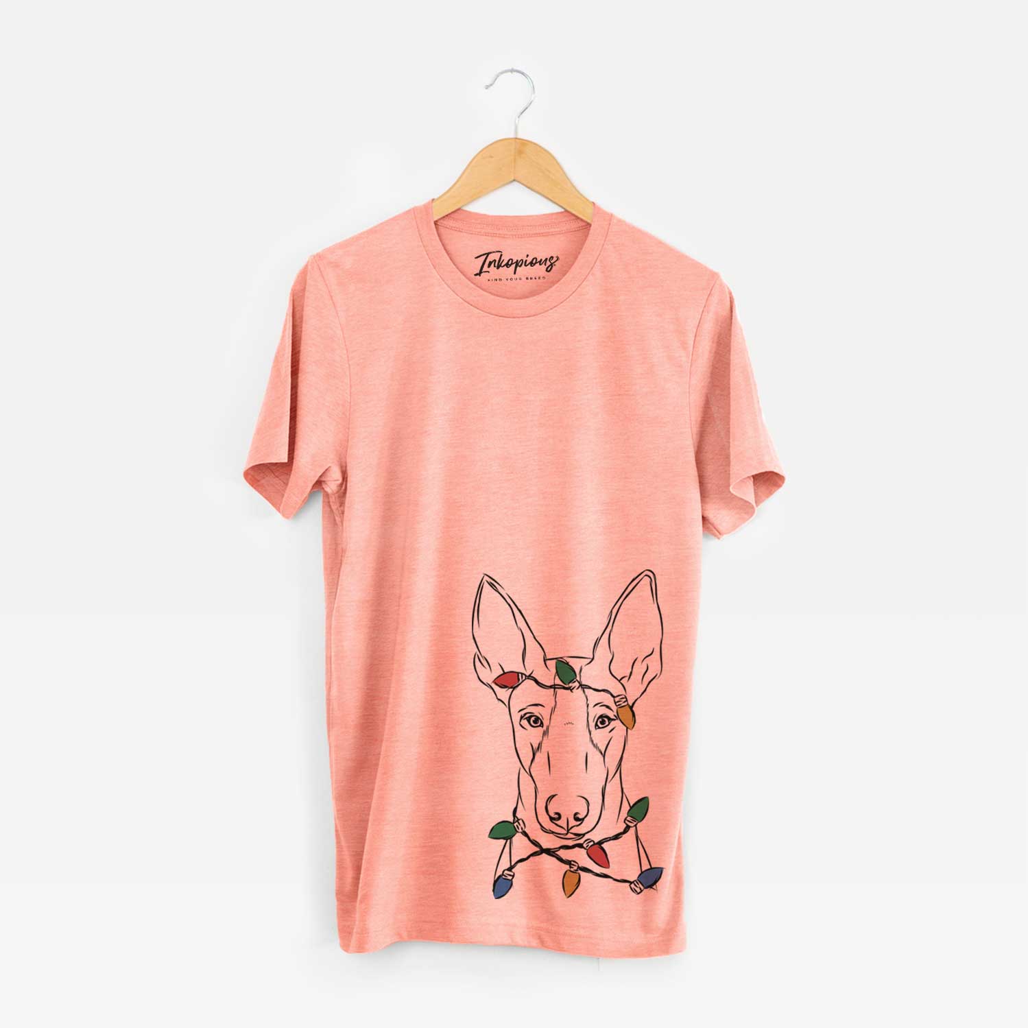 Hand-drawn sketch of Indy the Ibizan Hound wrapped in Christmas lights on a Sunset Unisex crewneck