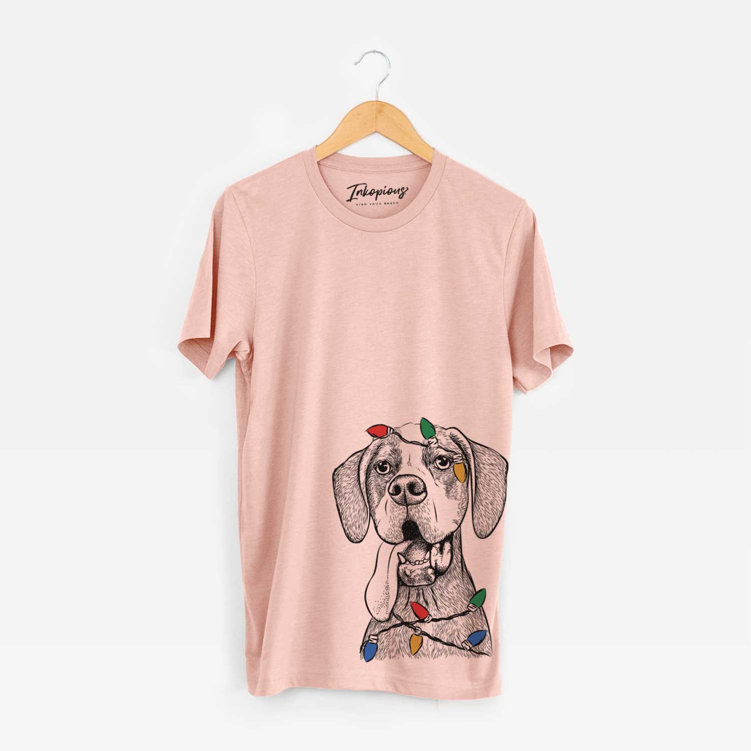 Hand-drawn sketch of Irwin the English Pointer wrapped in Christmas lights on a Peach Unisex crewneck